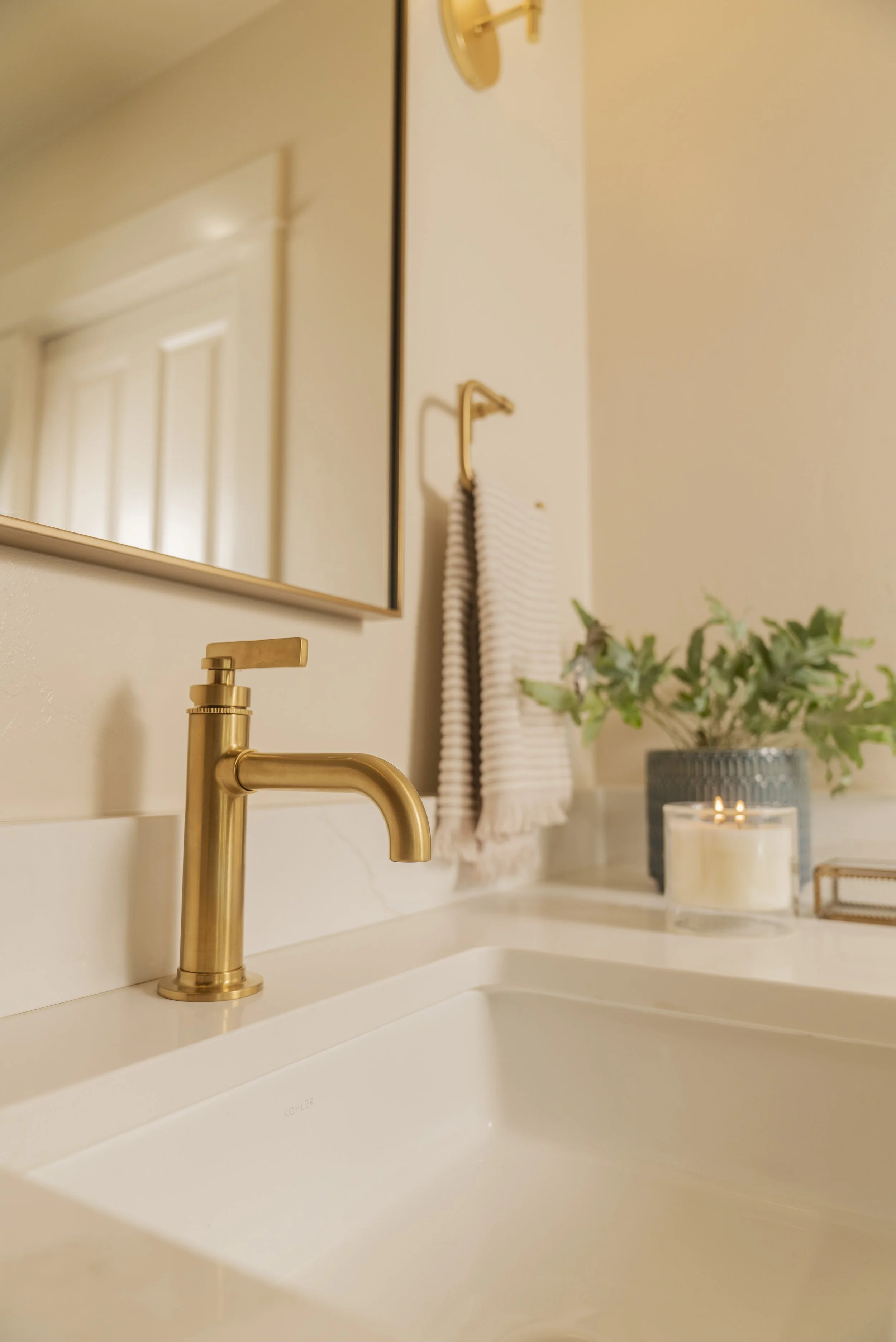 BRASS FAUCETS WITH QUARTZ COUNTERTOPS