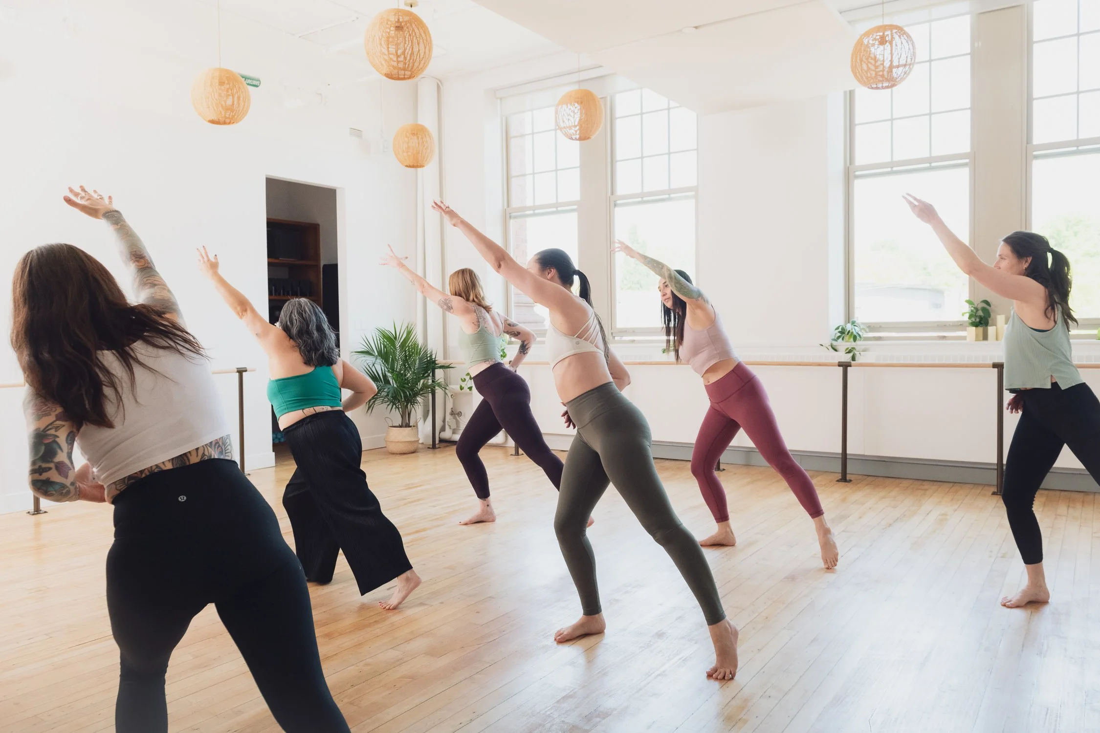 Students enjoy a good stretch in a pilates class at Muse Movement in Toronto