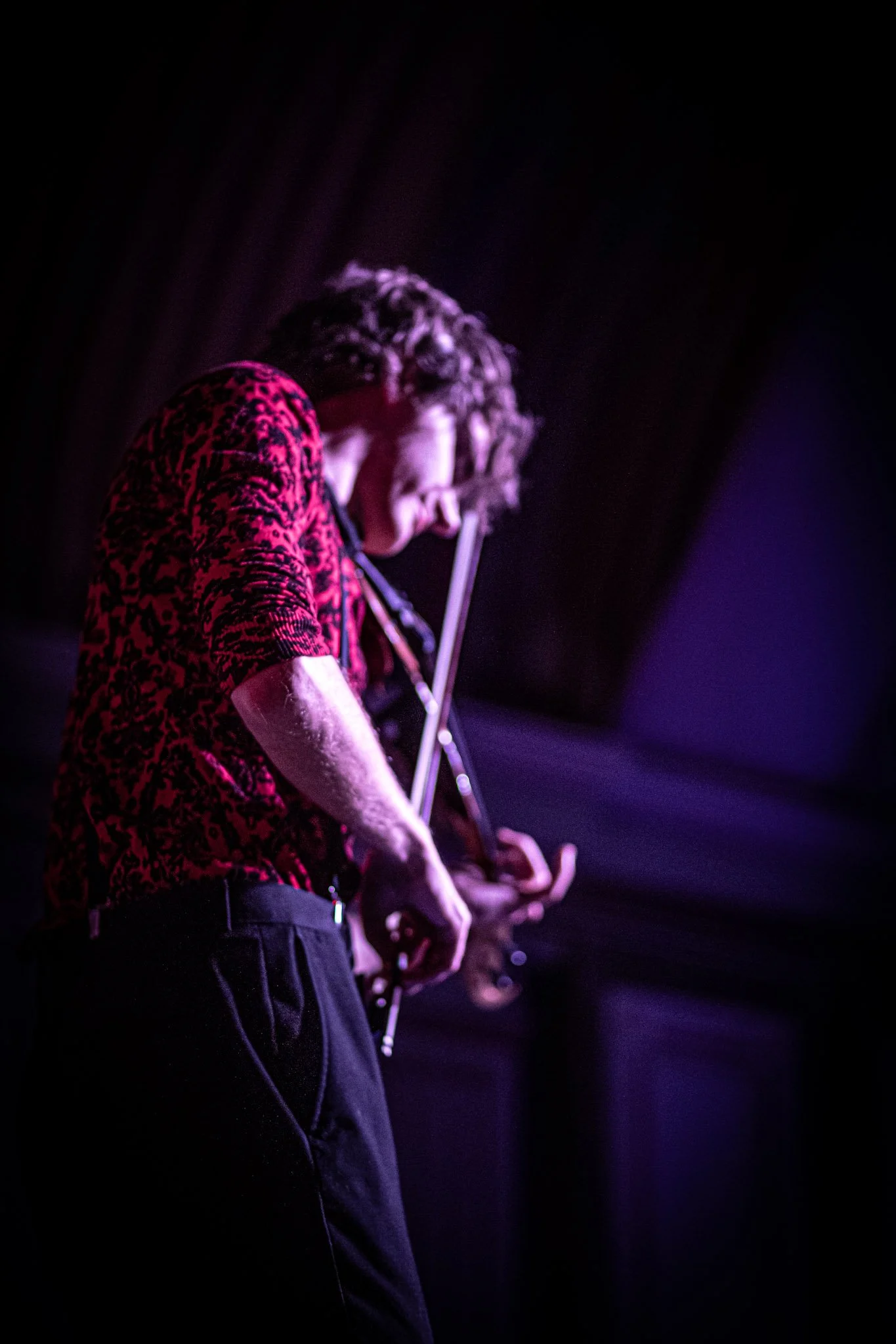 Armbruster performing electric violin at Troy Savings Bank Music Hall