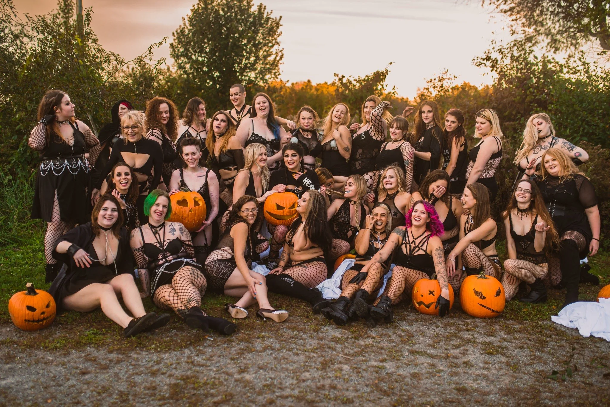 halloween group photoshoot with pumpkin heads