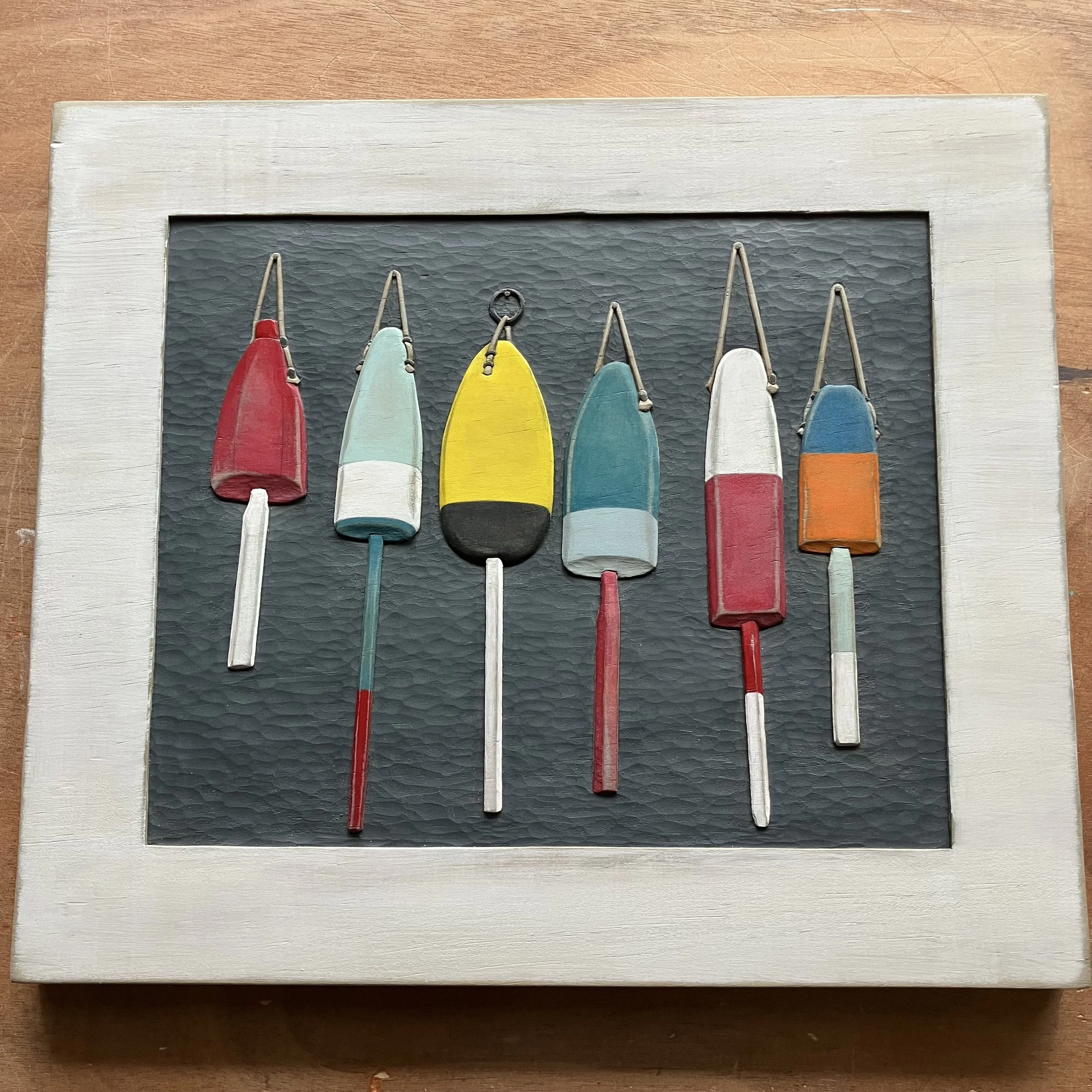SOLD:  Six Buoys Wood Carving - 11 x 13 inches.