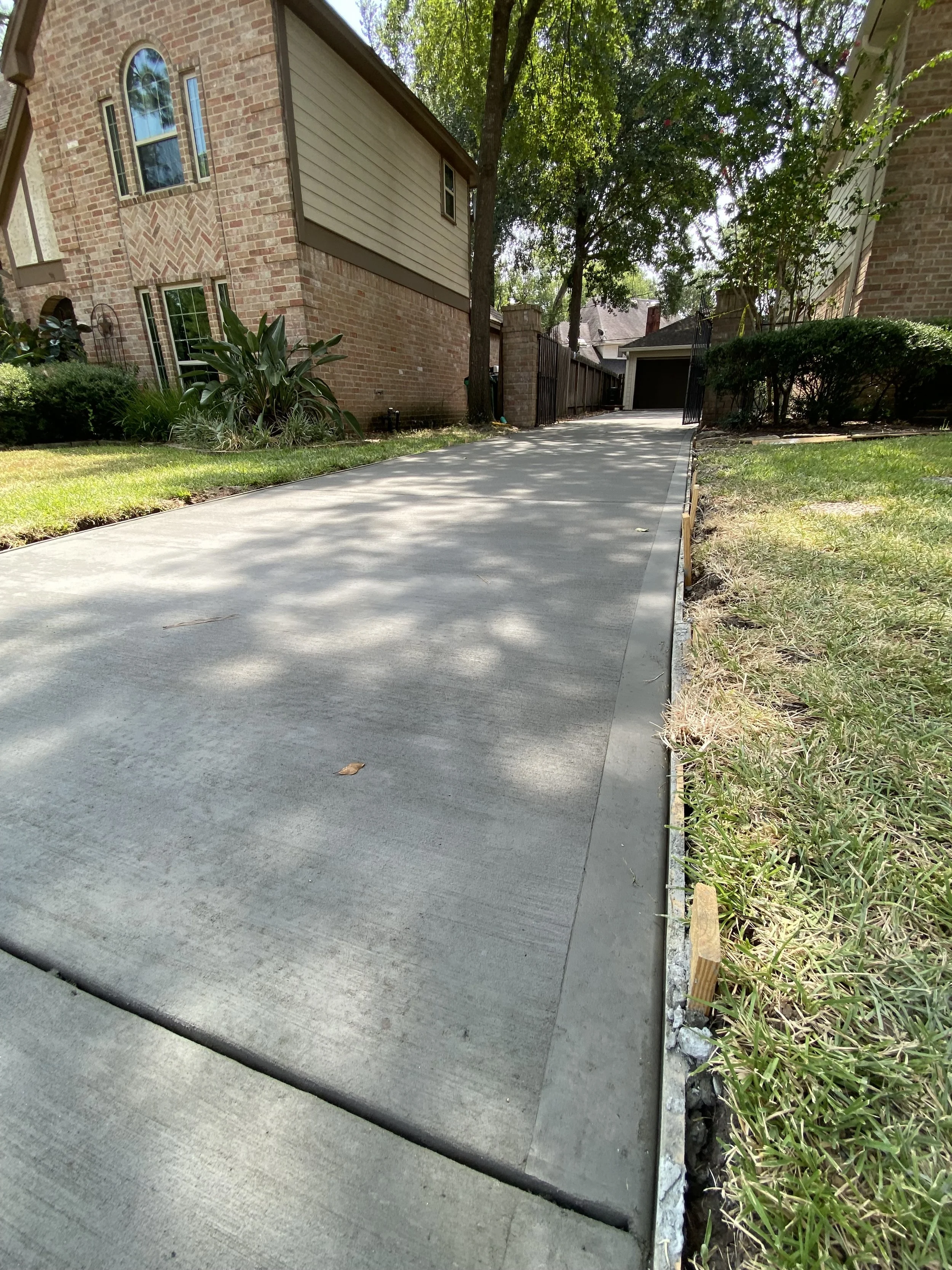 Enhance Your Home with a Durable Concrete Driveway