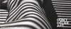 Black and white striped fabric with the text 'DON'T DELETE ART' and a small trash can icon. Photo credit: Savannah Spirit.