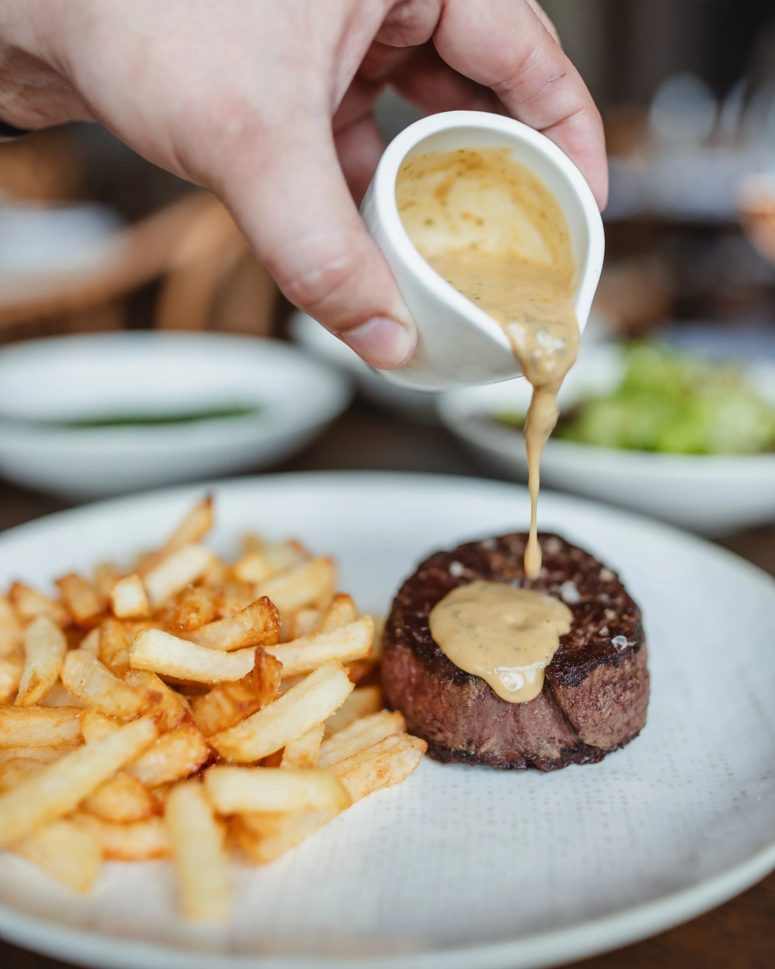 Swipe to add sauce to your steak frites! 🥩

Pepper Brandy? Bearnaise? Or Roquefort? Which one will it be?

The classic Steak Frites has been a staple of French gastronomy since the 19th century. Its simple flavours will satisfy you every time, and w