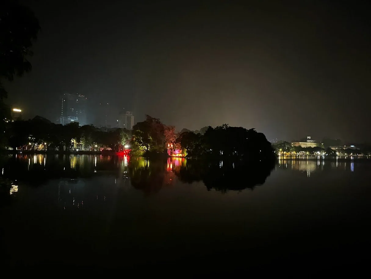 A small lake in central Hanoi that men were catching frogs in: breakfast!
