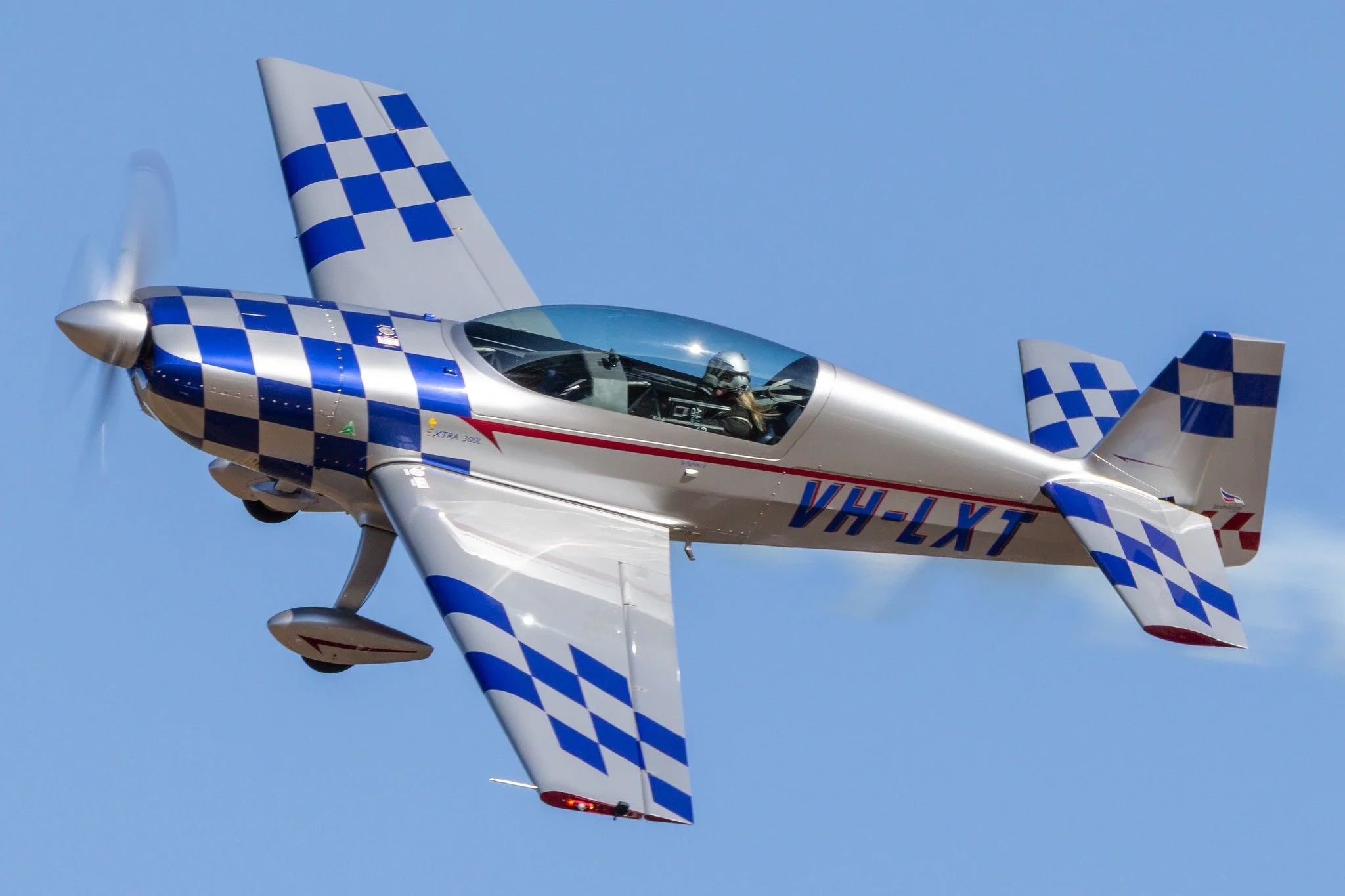 Emma McDonald showing off her new display in a stunning Extra 300L at The Old Station Airshow.