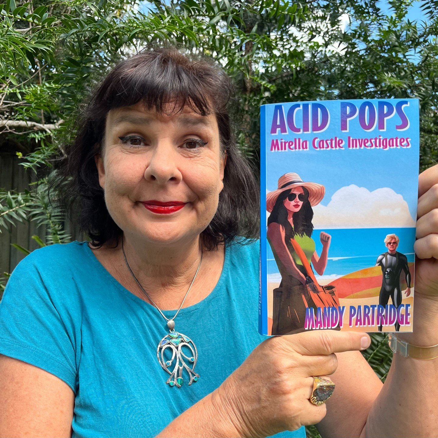 Mandy Partridge with her new book, Acid Pops. 100 free Ebook are available at Goodreads for American, Canadian and British readers, till the 20th of April 2024.