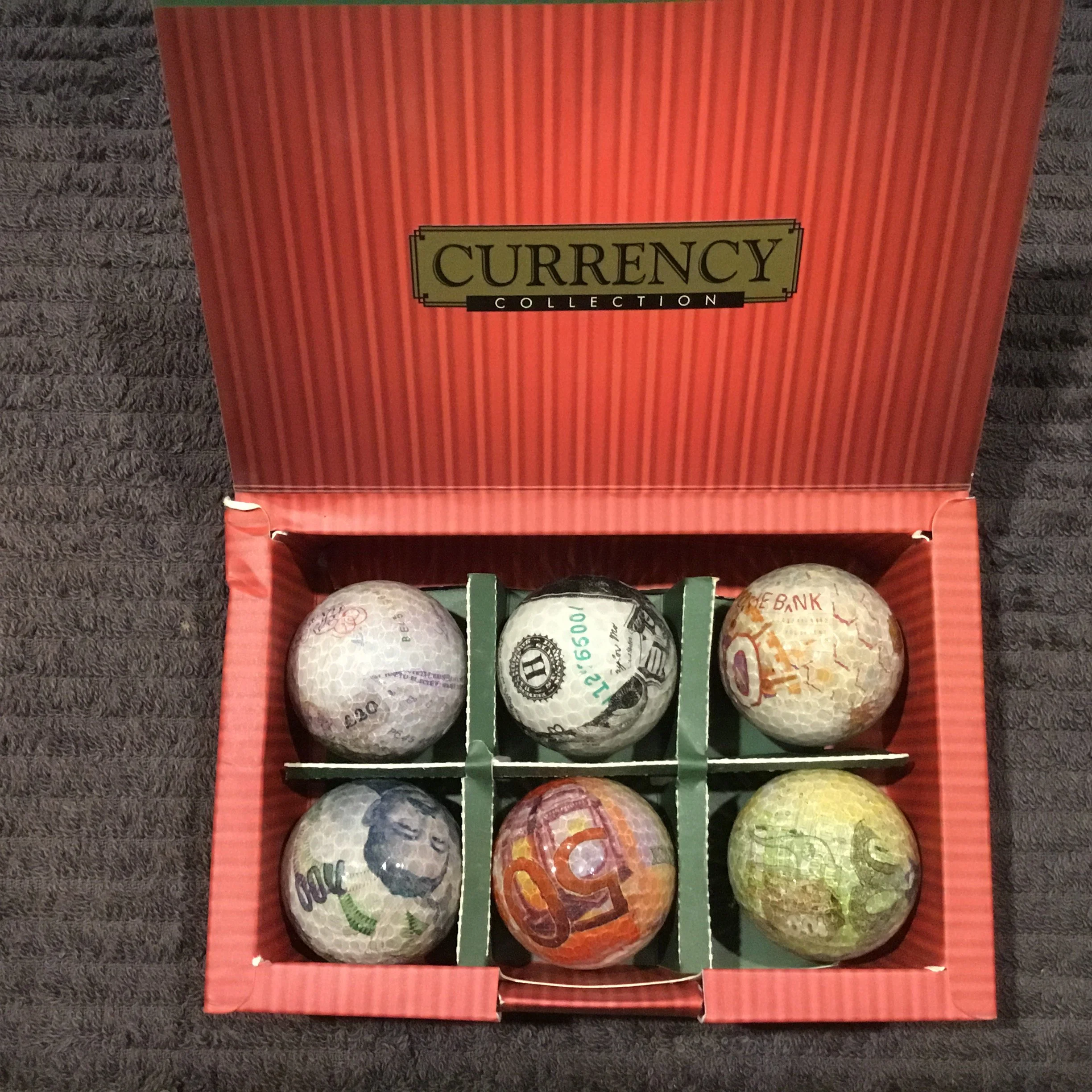 Boxed half dozen collectable Money Balls set
