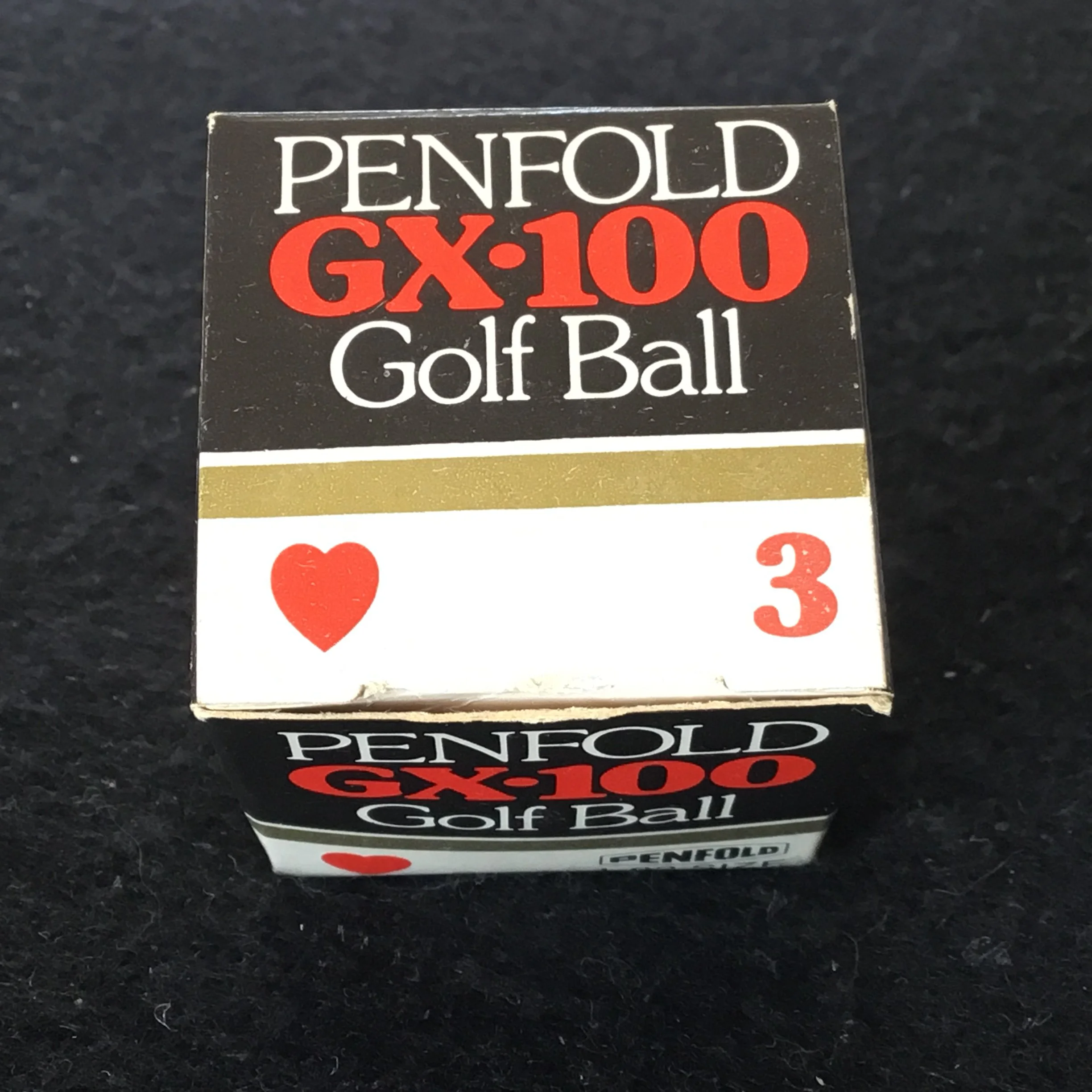 Penfold GX - 100 boxed golf ball