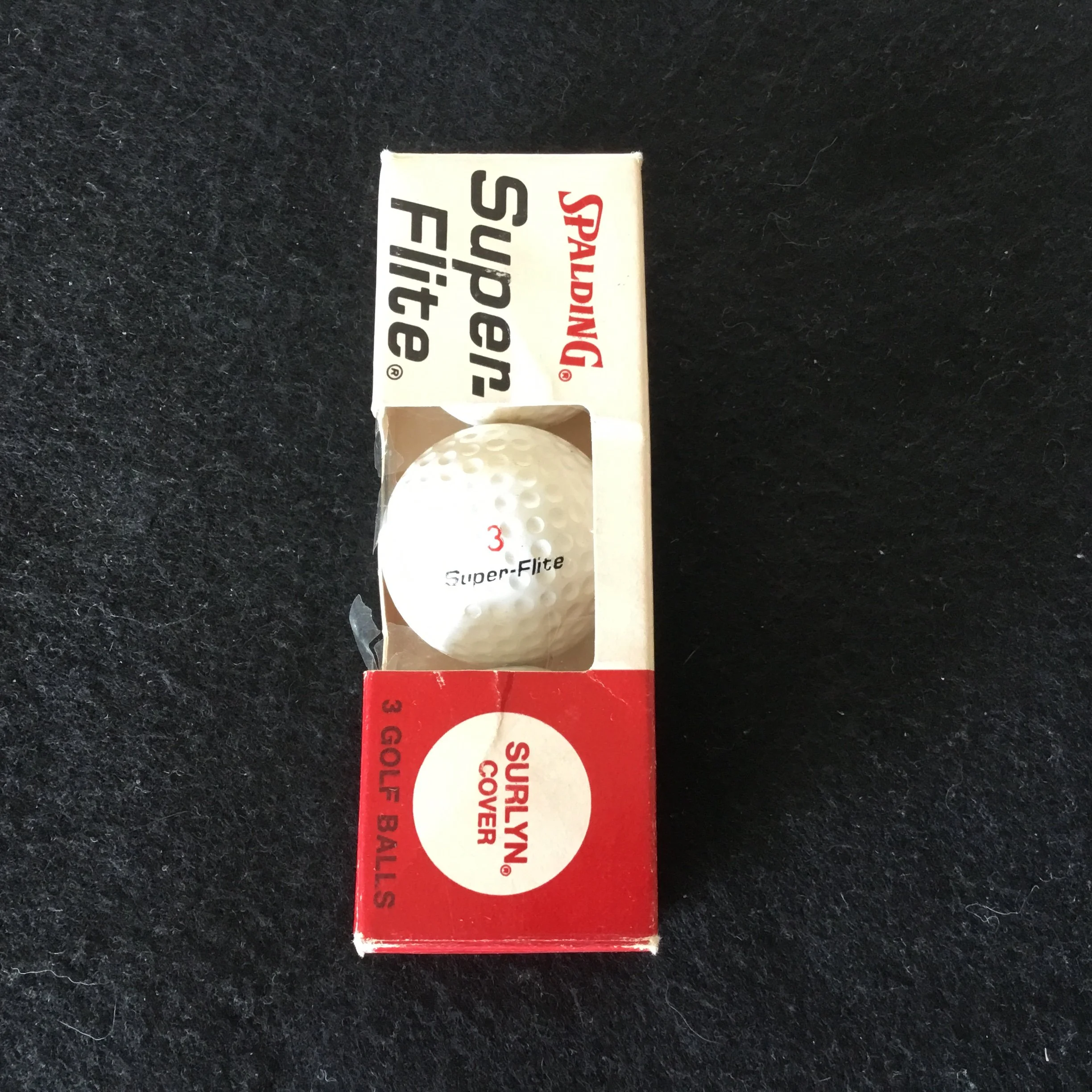 Spalding Super Flite sleeve of three golf balls
