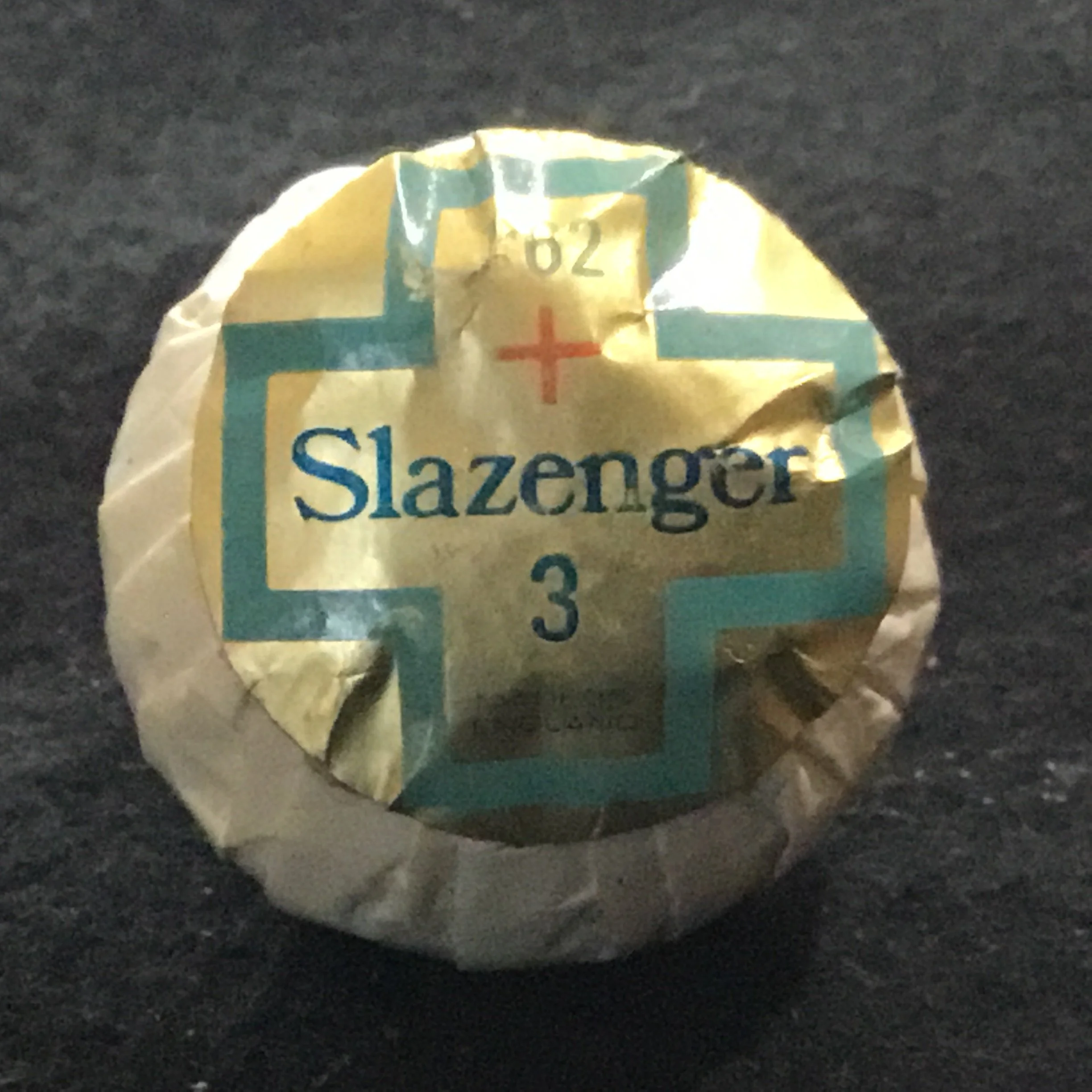 Slazenger + wrapped golf ball