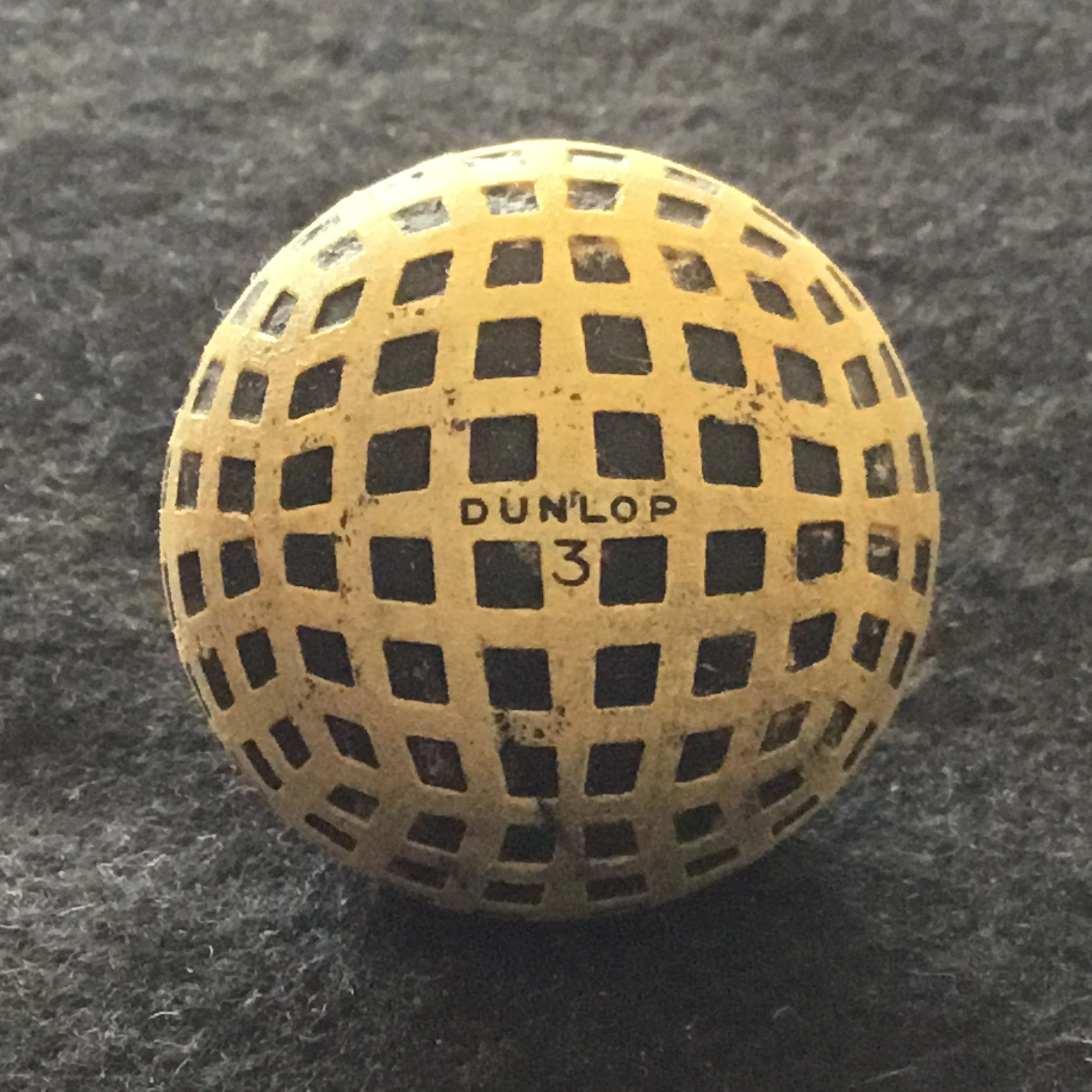 Dunlop - England - Square Mesh Gutta Percha reconditioned pond ball