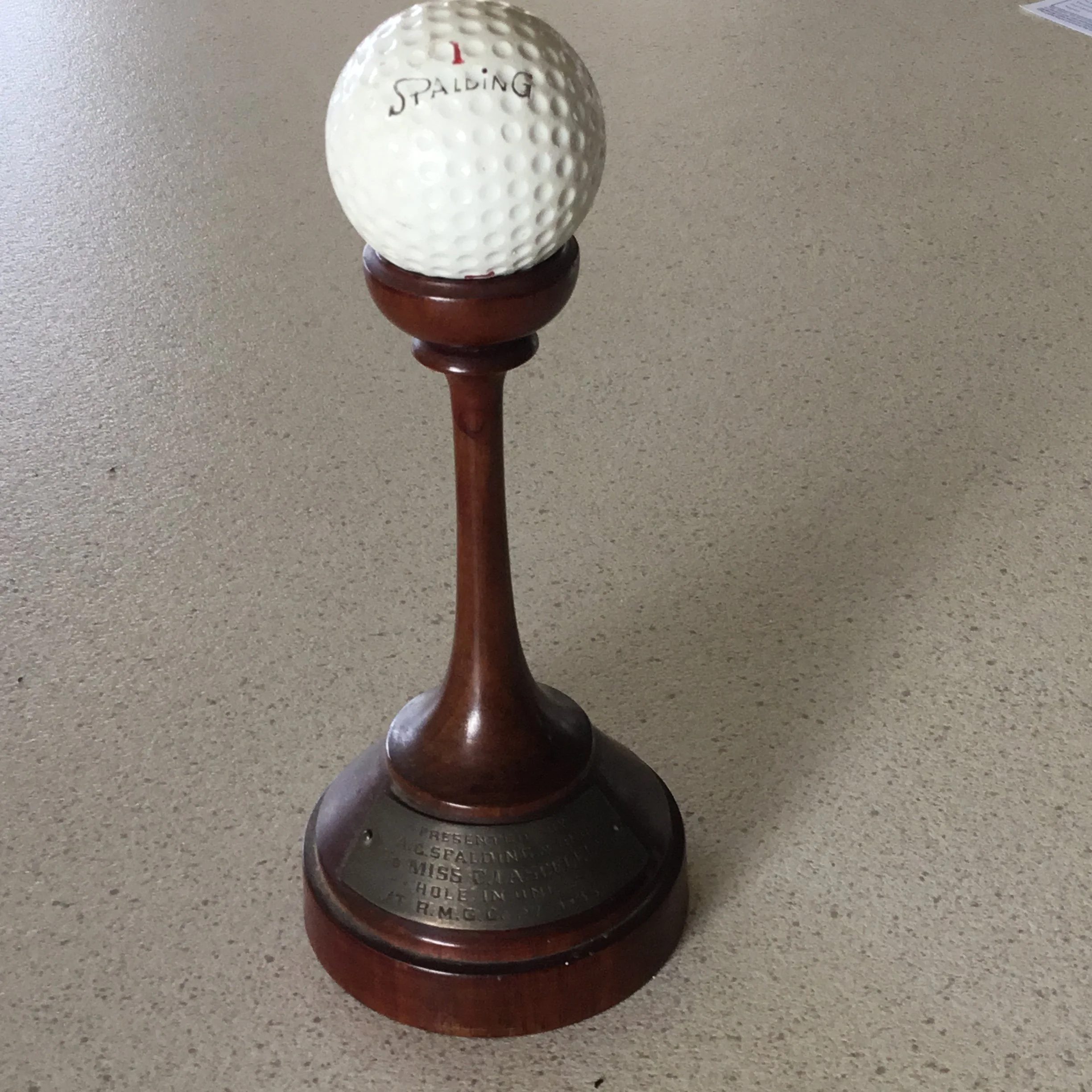 Hole in One Trophy presented by A.G.Spalding &amp; Bros. To Miss C Lascelles at R.M.G.C. (Royal Melbourne Golf Club) 27- 9 - 35