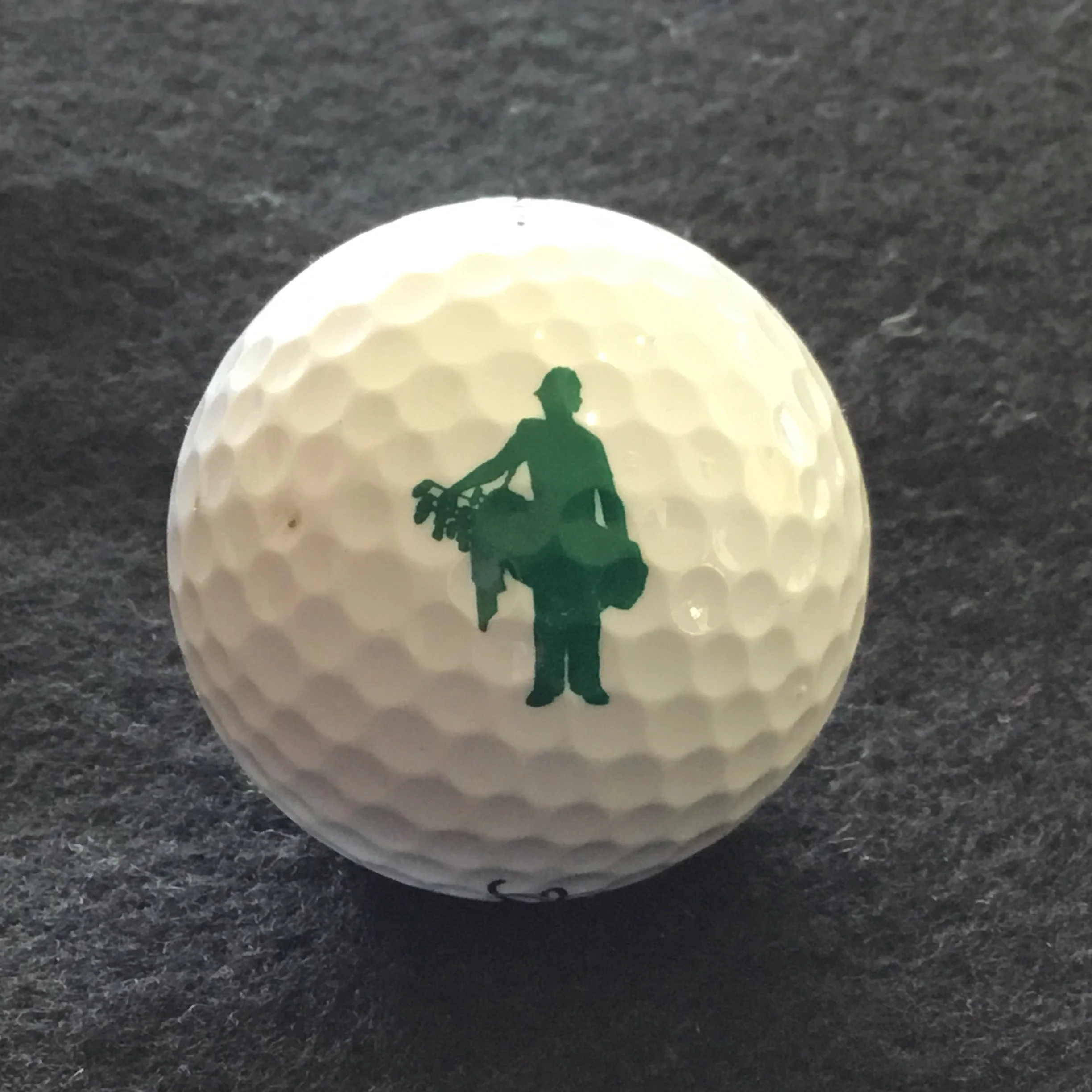 Caddy carrying bag of clubs