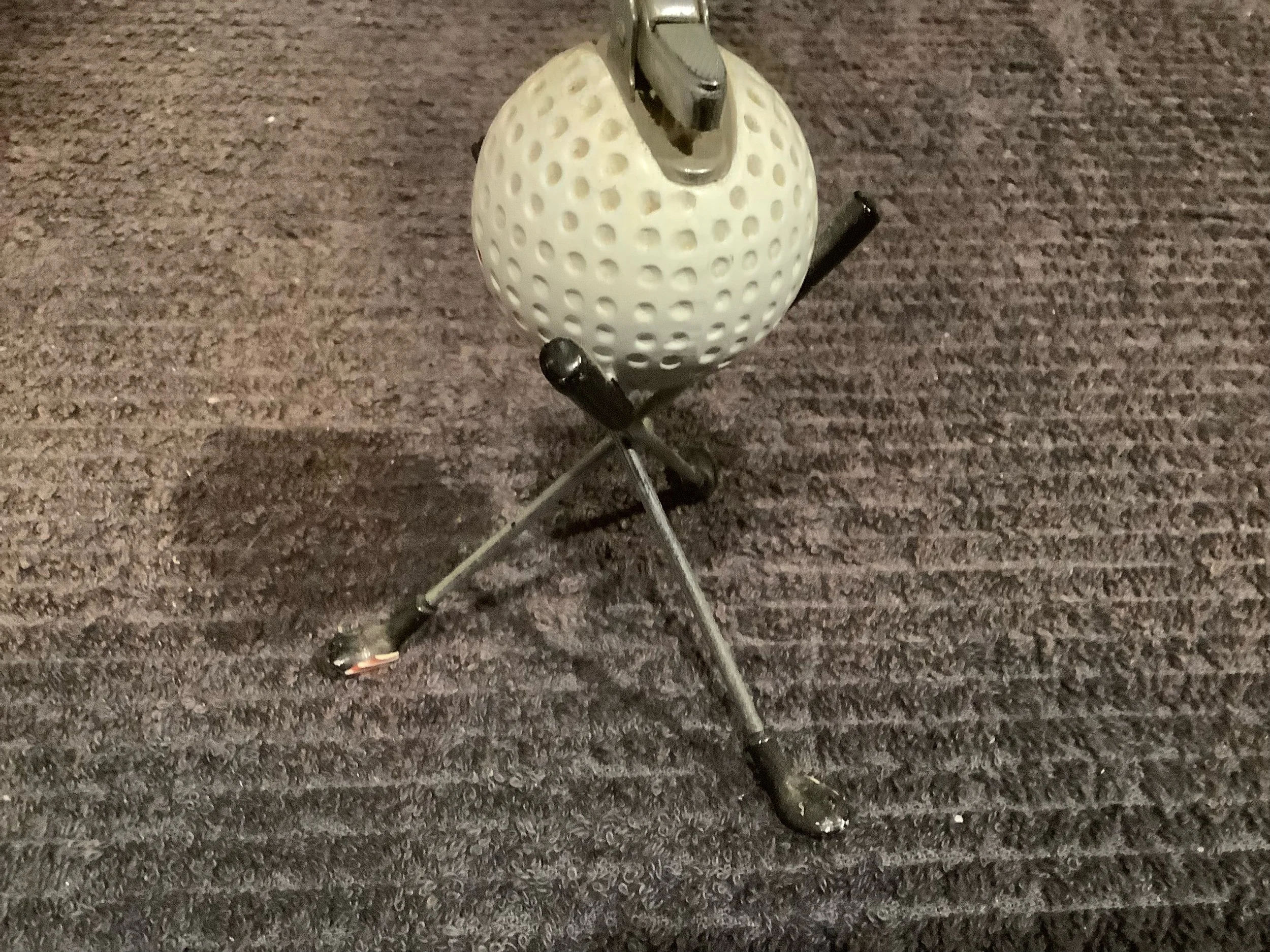 Golf Ball Cigarette Lighter on Three Woods Stand