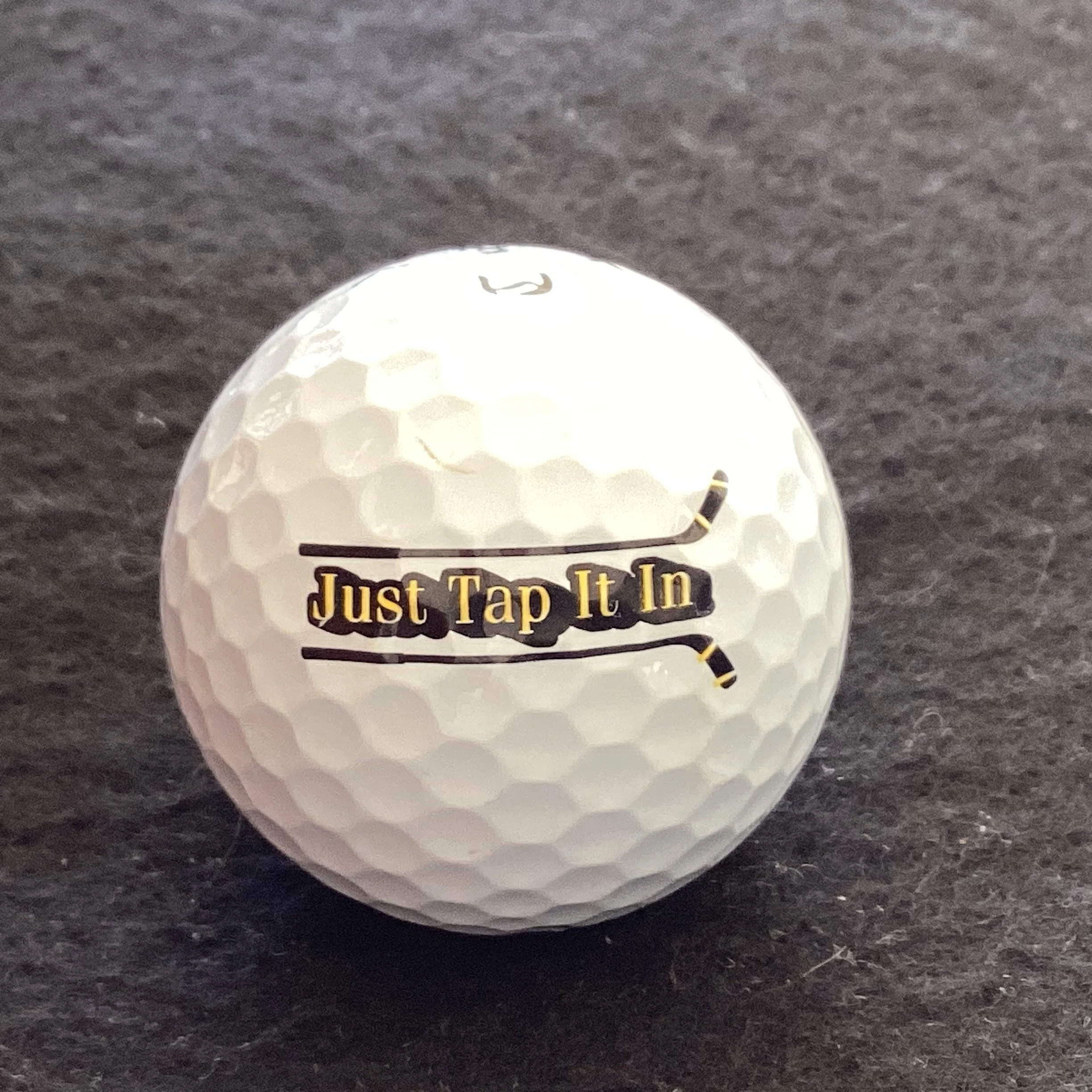 Callaway Just Tap it in Special Edition logoball from the movie Happy Gilmore 2