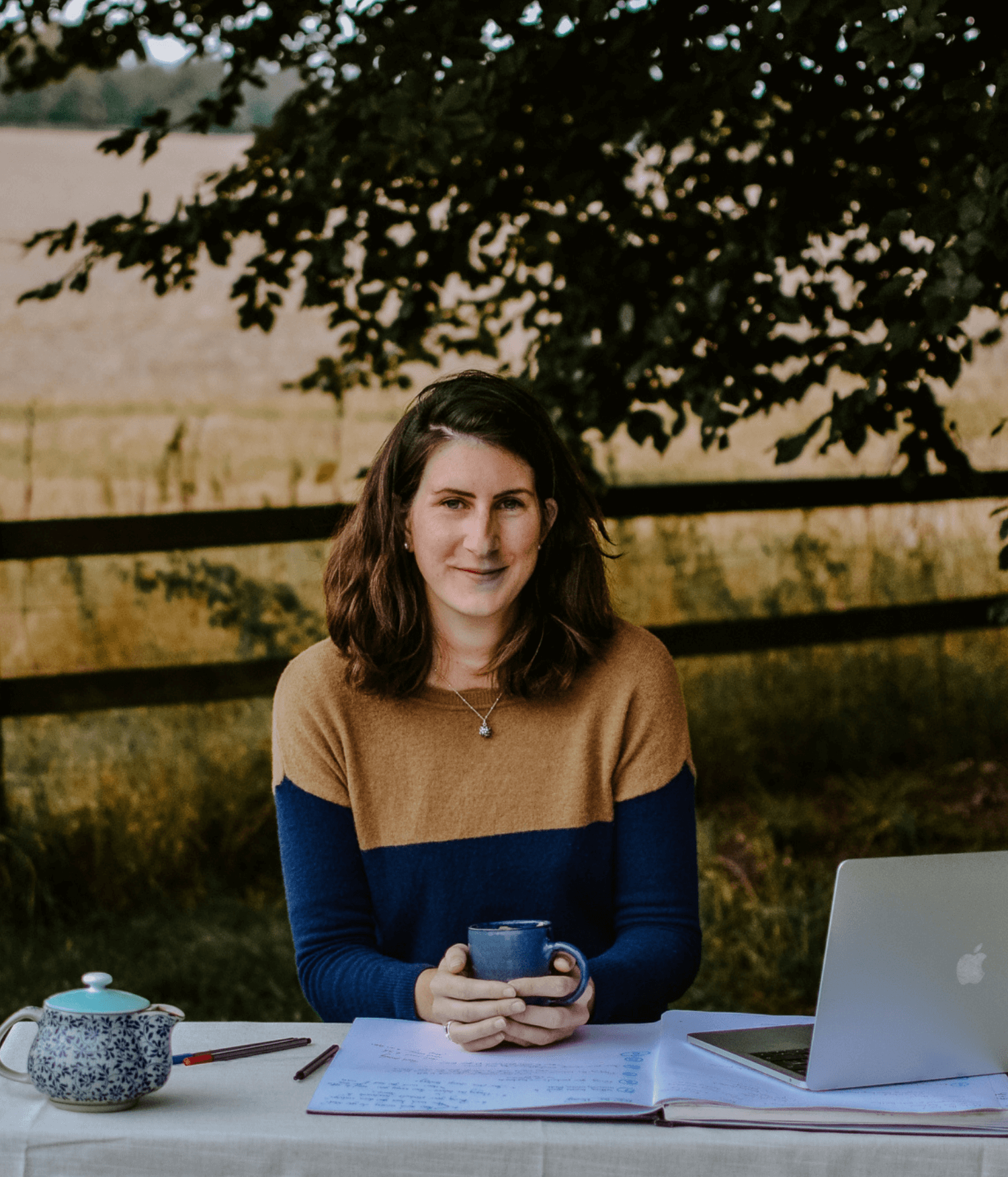 Josephine Brooks working from the garden