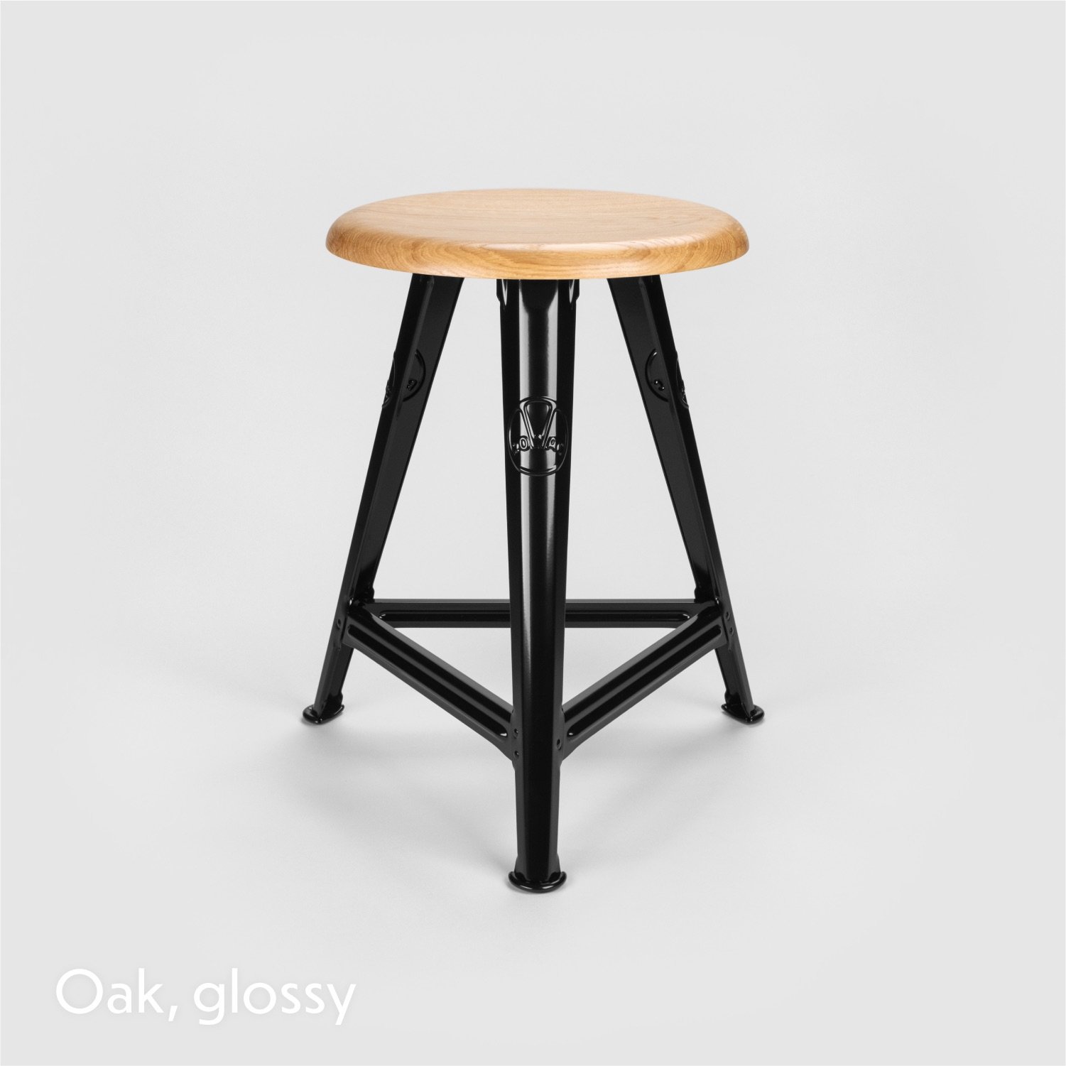 The Rowac-Schemel or workshop stool is the archetype of industrial design furniture. The stool is made of riveted sheet steel. Glossy powder-coated with an oak seat top.