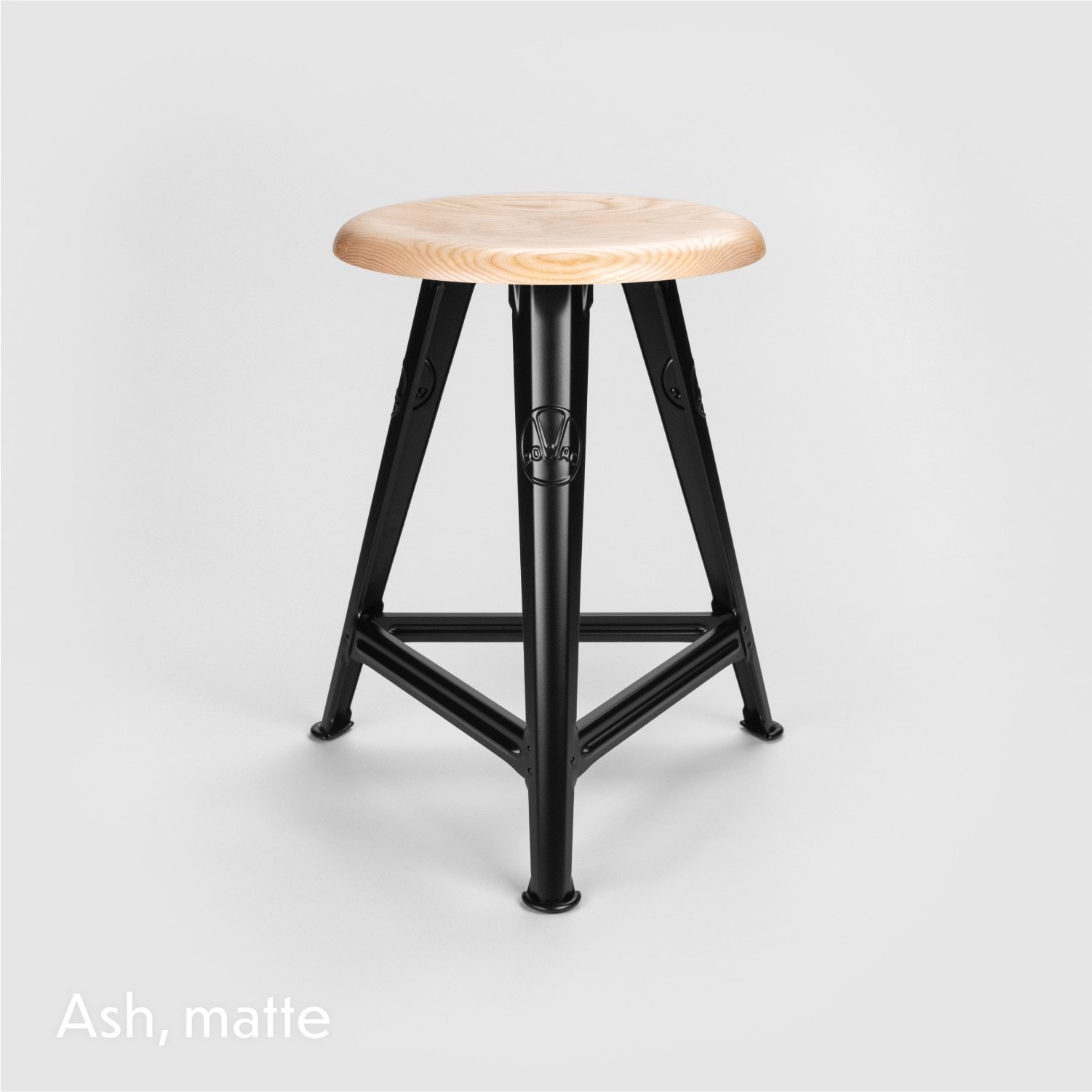 The Rowac-Schemel or workshop stool is the archetype of industrial design furniture. The stool is made of riveted sheet steel. Matte powder-coated with an ash seat top.