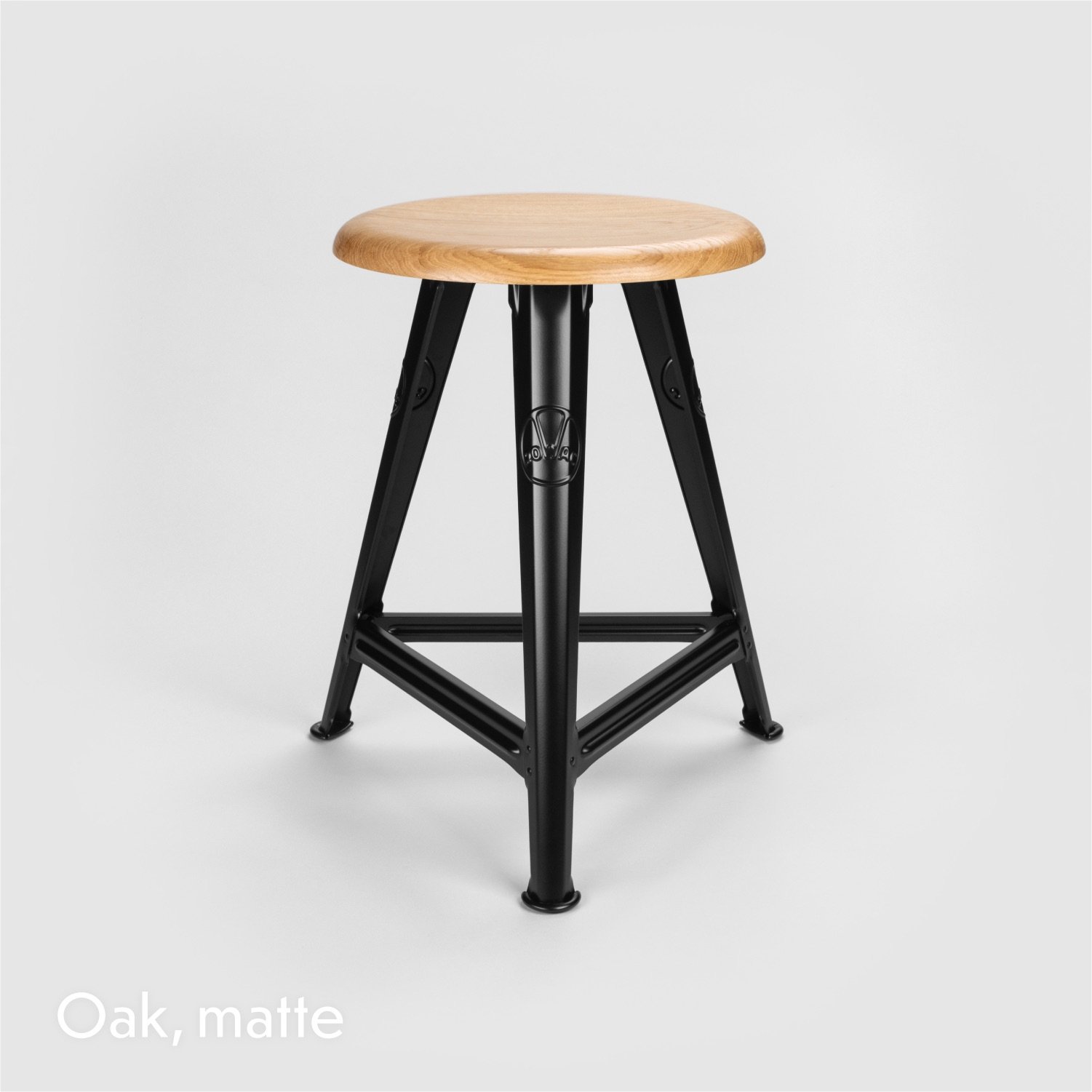 The Rowac-Schemel or workshop stool is the archetype of industrial design furniture. The stool is made of riveted sheet steel. Matte powder-coated with an oak seat top.