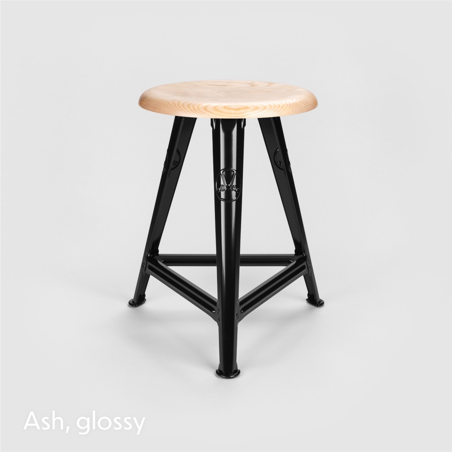 The Rowac-Schemel or workshop stool is the archetype of industrial design furniture. The stool is made of riveted sheet steel. Glossy powder-coated with an ash seat top.