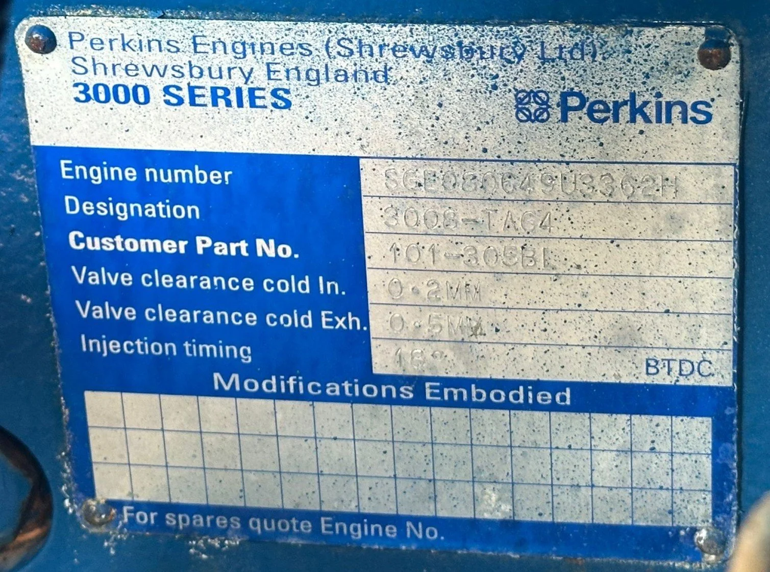 Identification plate for Perkins Engines, West Sussex, England, from the Perkins 3000 Series. It includes engine details such as engine number, designation, customer part number, valve clearance for cold intake and exhaust, injection timing, and modi