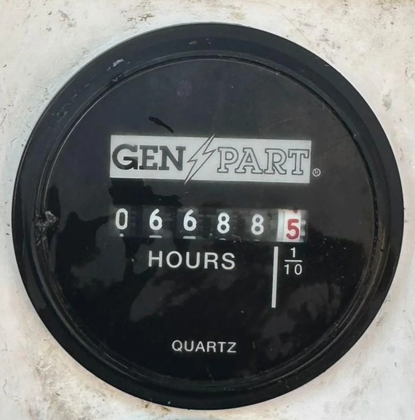 Black hours meter with white numbers reading 66,88,5 with hour labels, branded GEN PART, indicating 66.8 hours, labeled quartz.