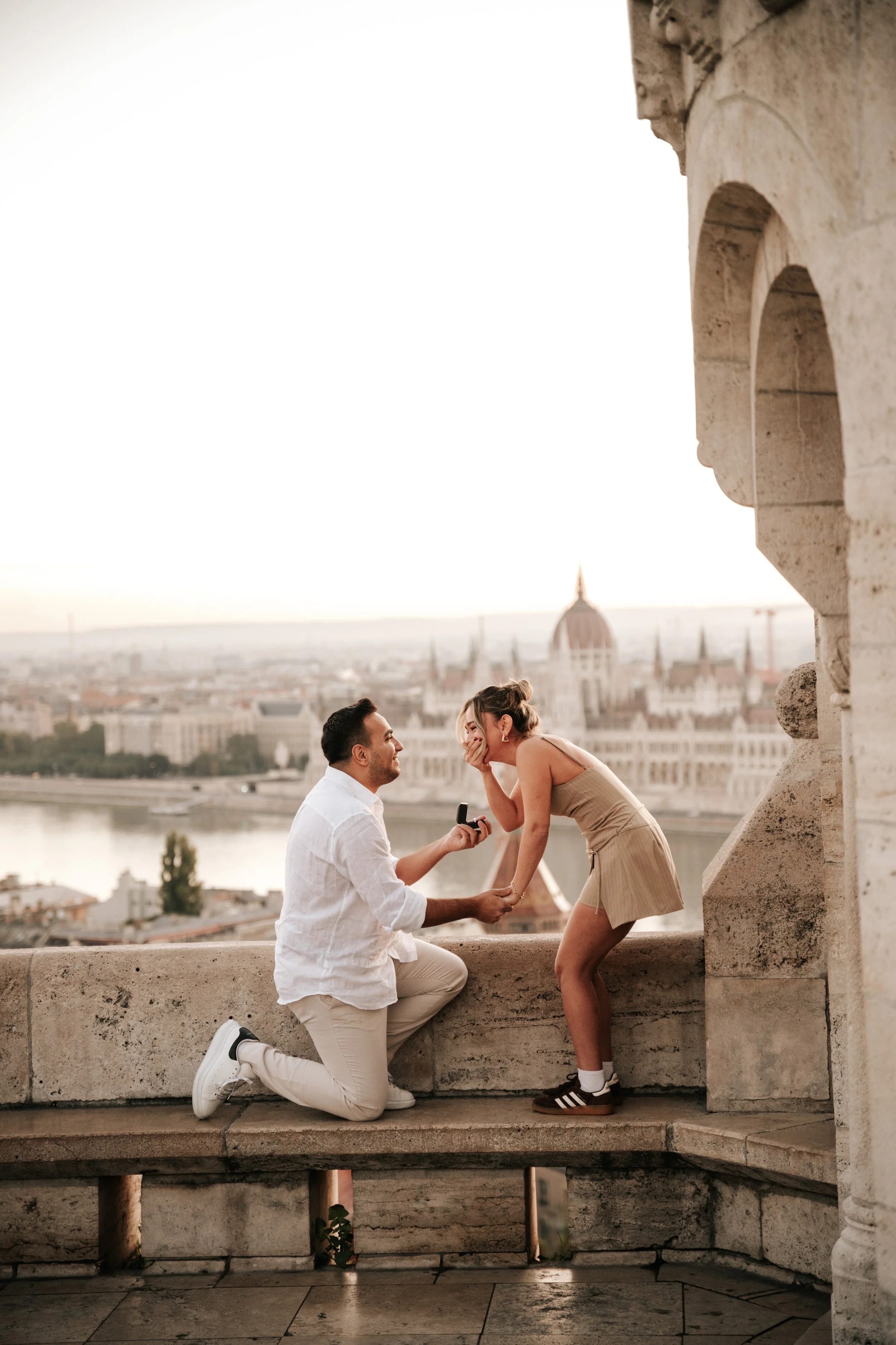 Emotional marriage proposal at Fisherman's Bastion overlooking Budapest