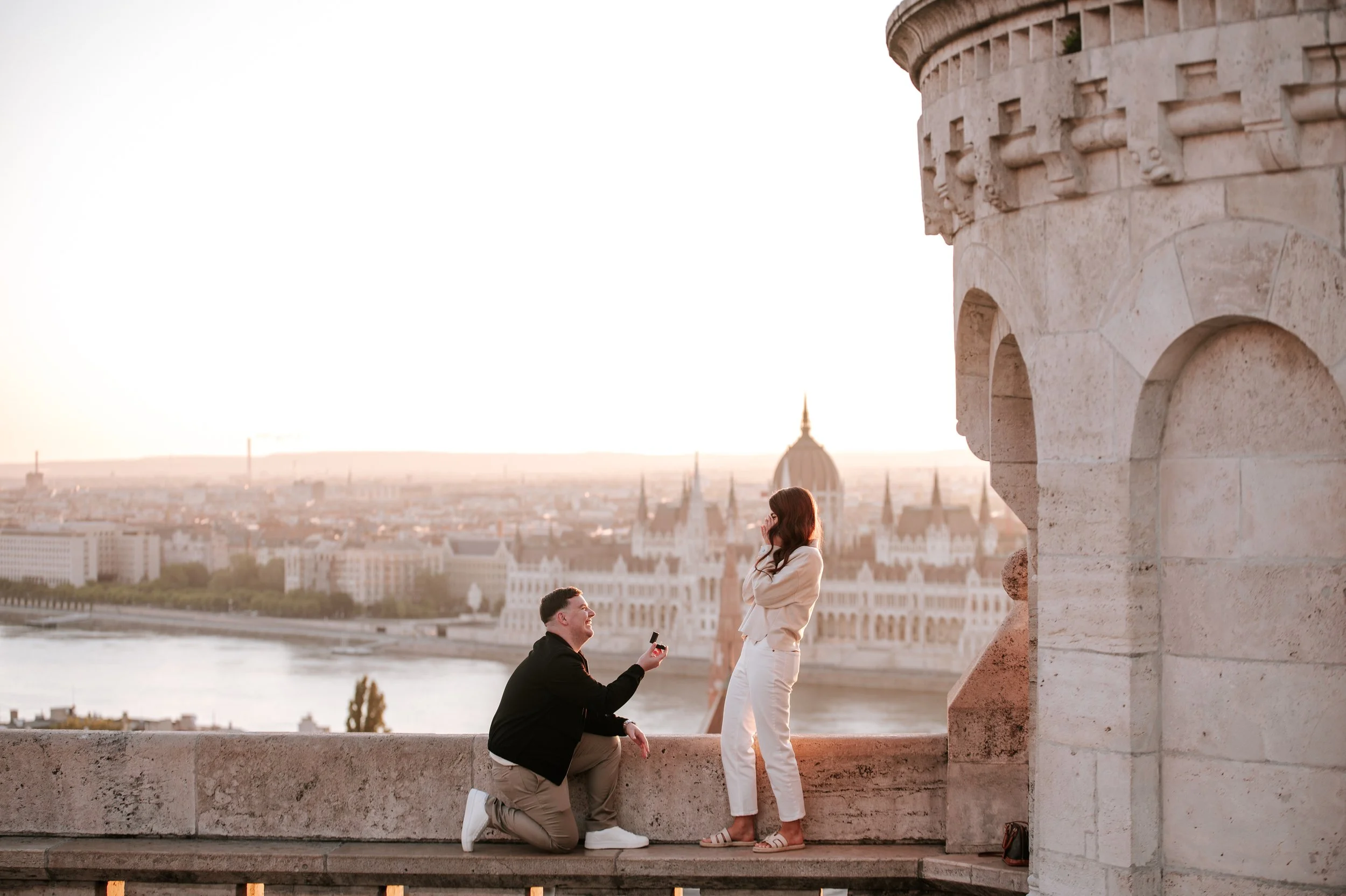 A surprise proposal for Tasha and Ross, during a beautiful sunrise at Fisherman's Bastion