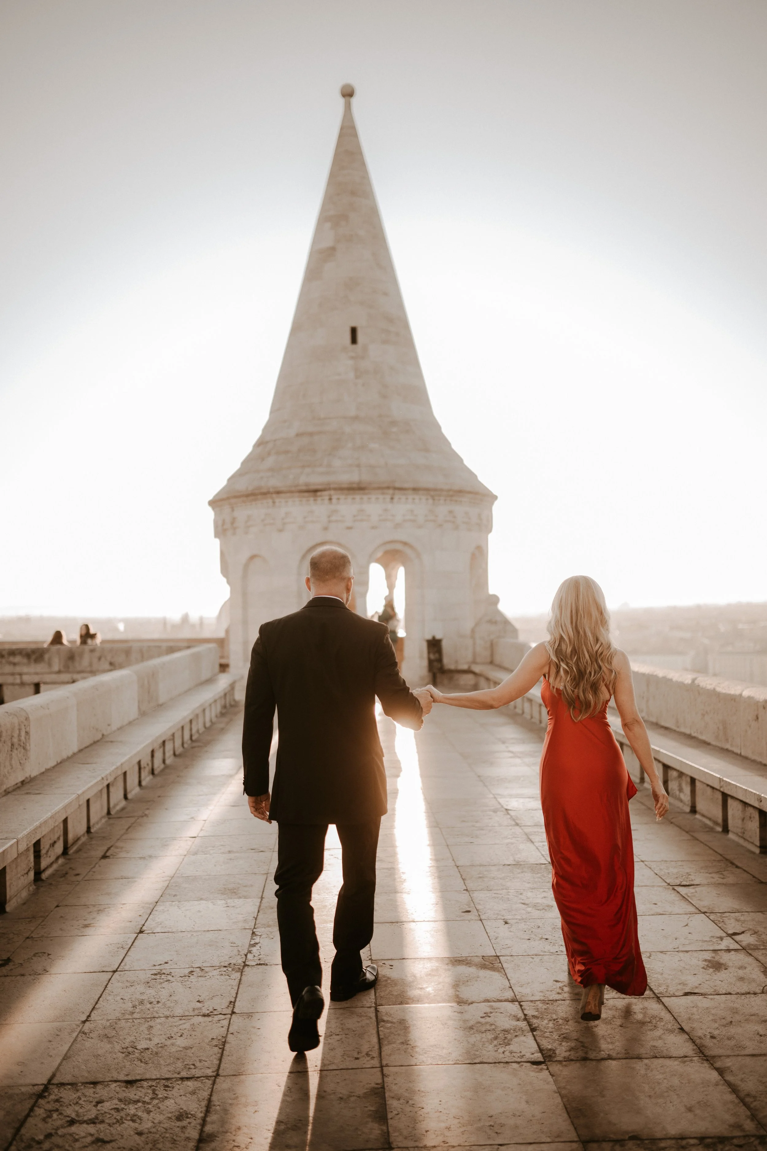 Holding hands on the upper terrace of Fisherman’s Bastion during their 20th anniversary photoshoot