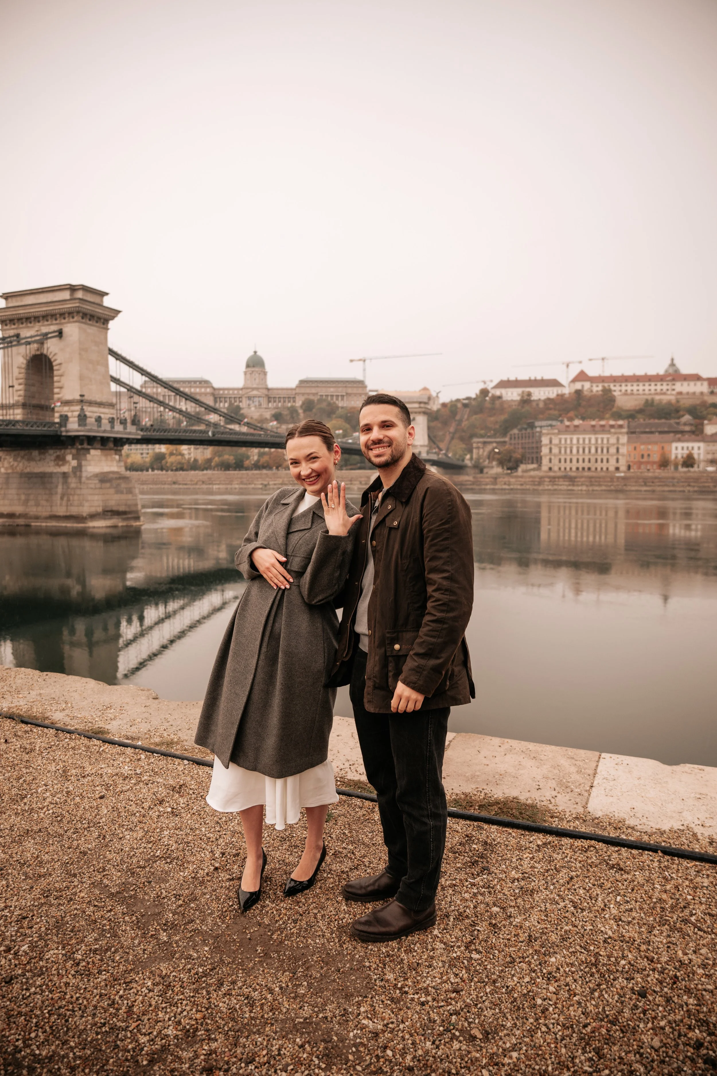 Just engaged — a portrait by the Chain Bridge after the surprise proposal