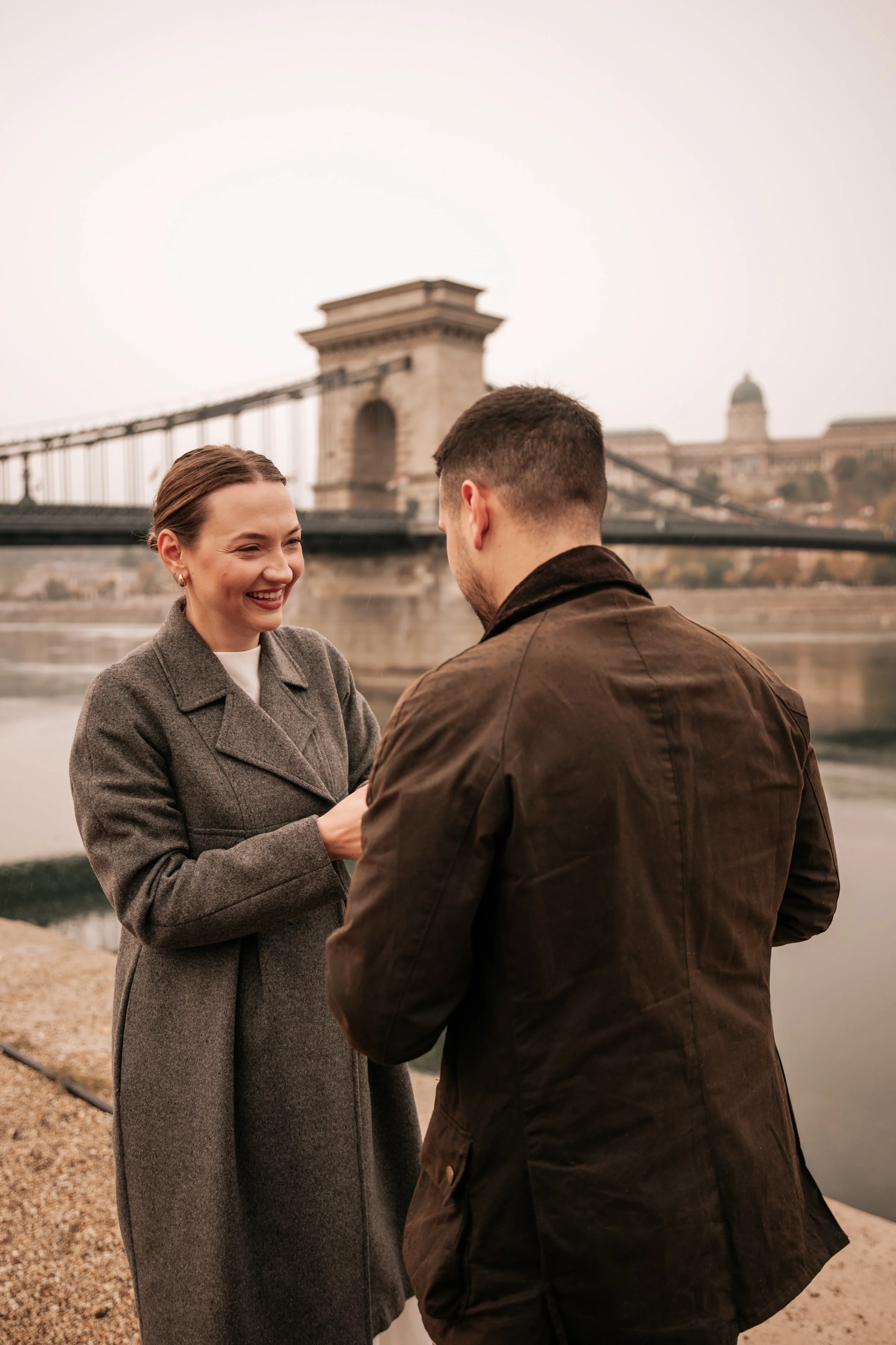 Capturing her reaction during a surprise proposal by Budapest’s Chain Bridge