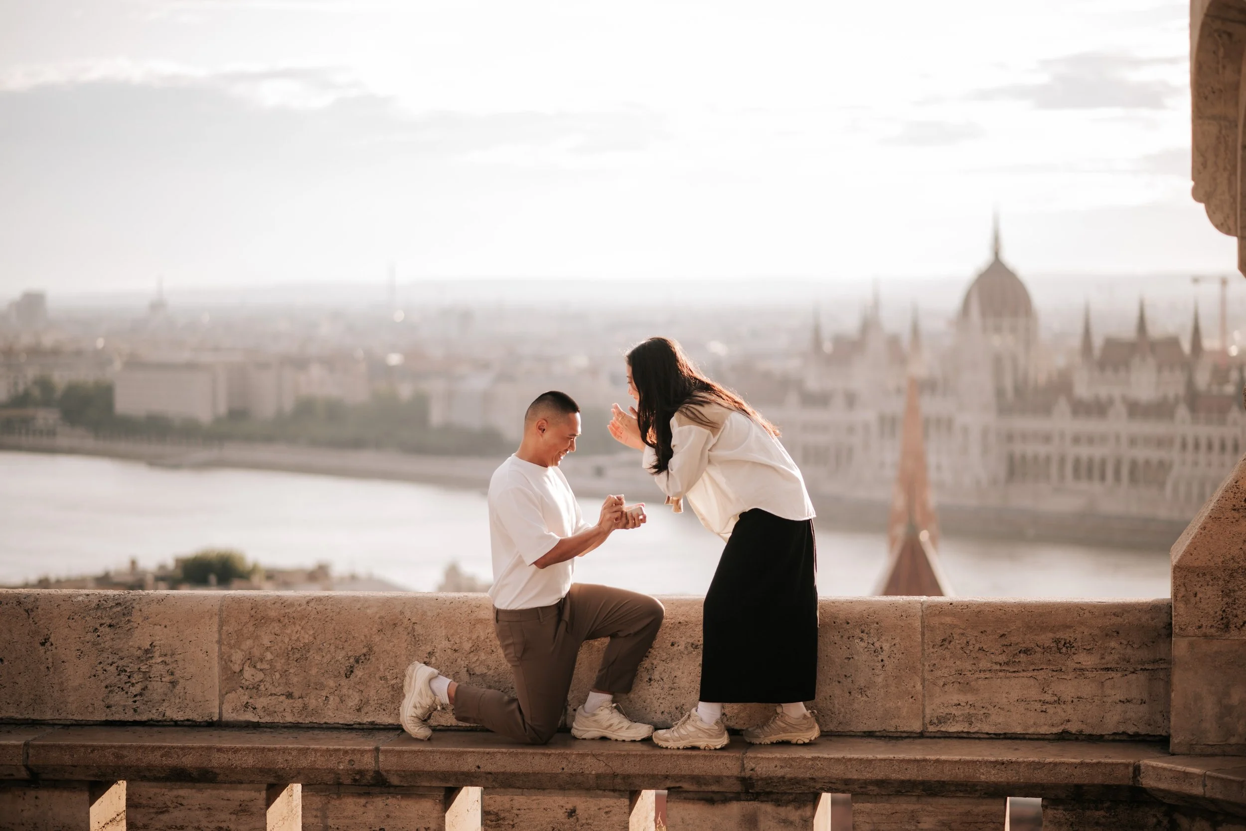 Romantic proposal at Fisherman's Bastion with Budapest Parliament views at sunrise
