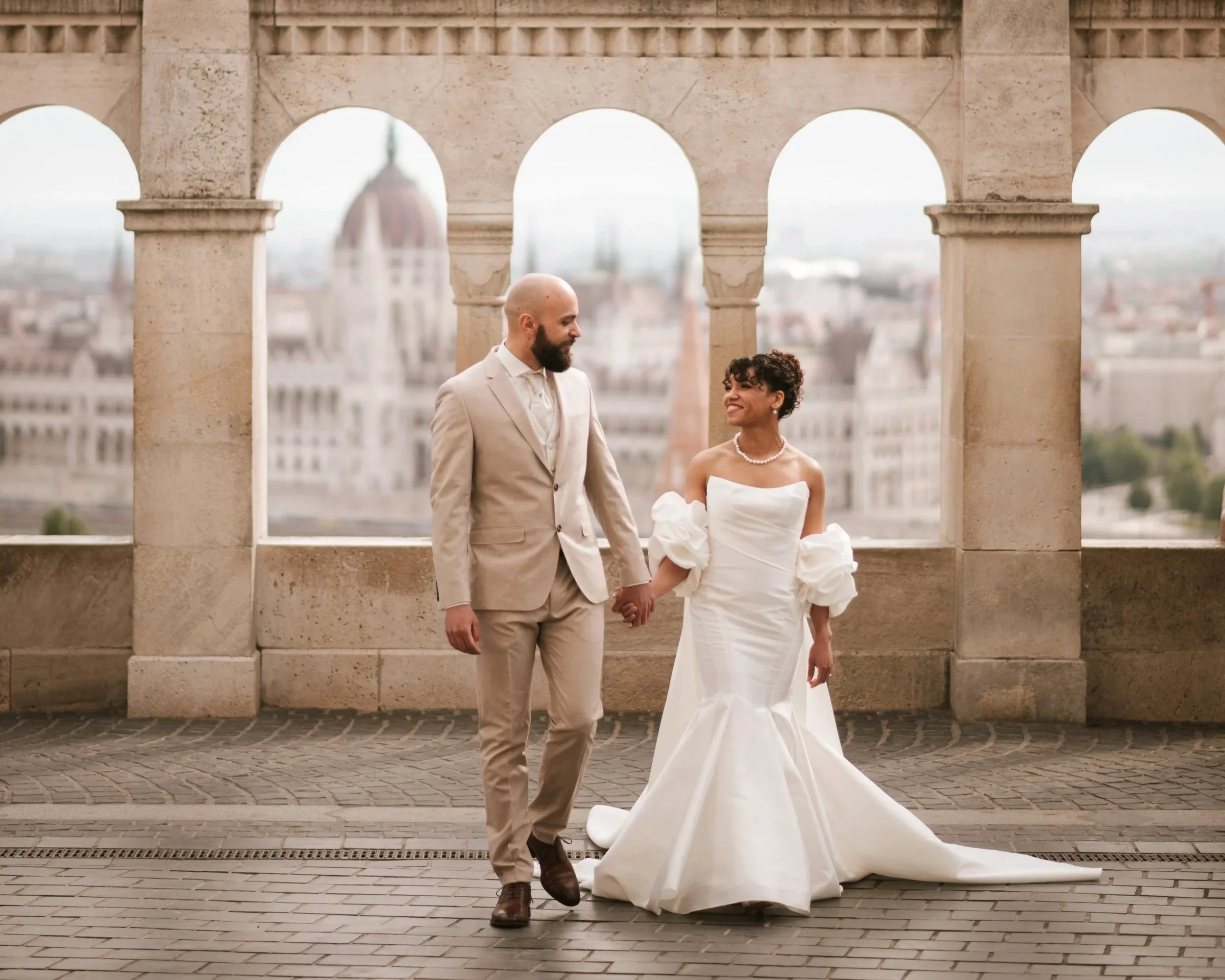 Wedding photoshoot at Fisherman’s Bastion in Budapest with panoramic city view