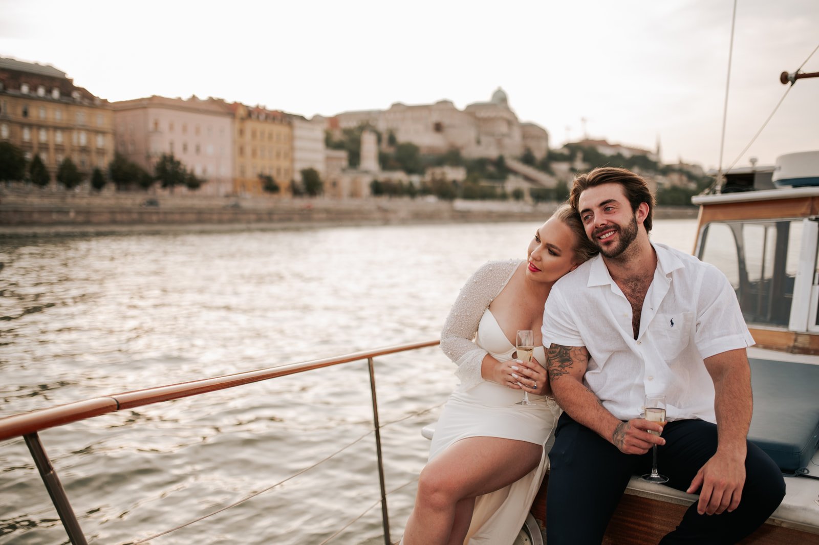 happy moments during a budapest proposal engagement photoshoot during sunset