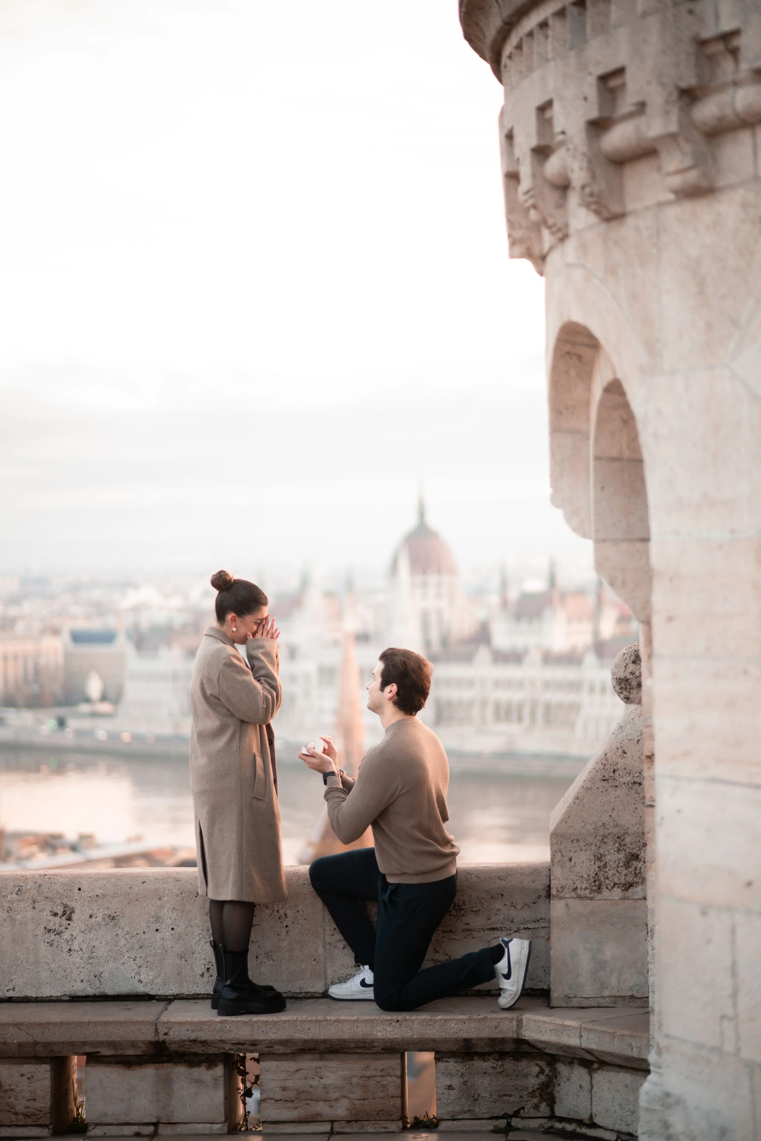 Surprise proposal at Fisherman's Bastion with Parliament views in Budapest