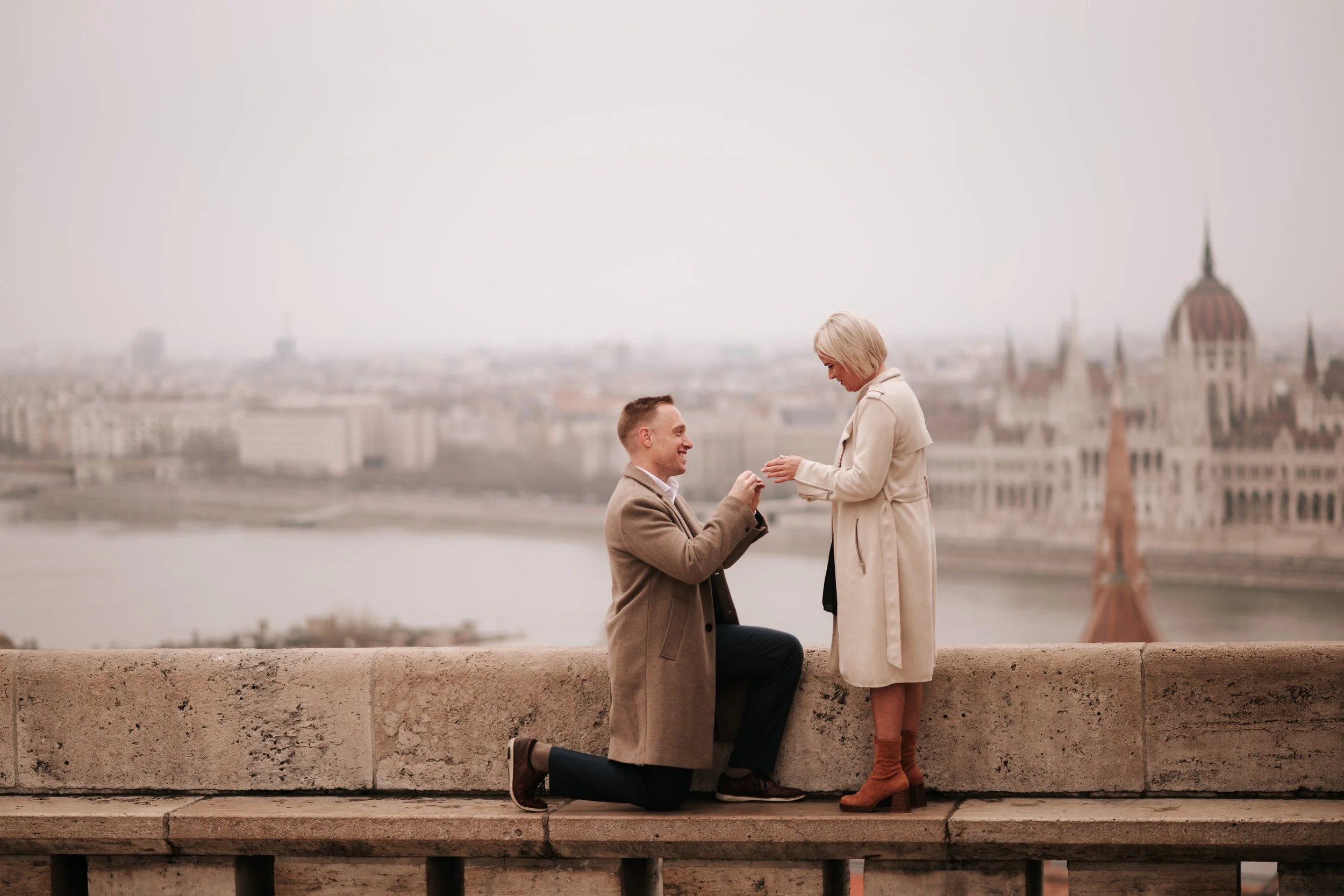 Romantic sunrise proposal with Budapest skyline views from Fisherman's Bastion