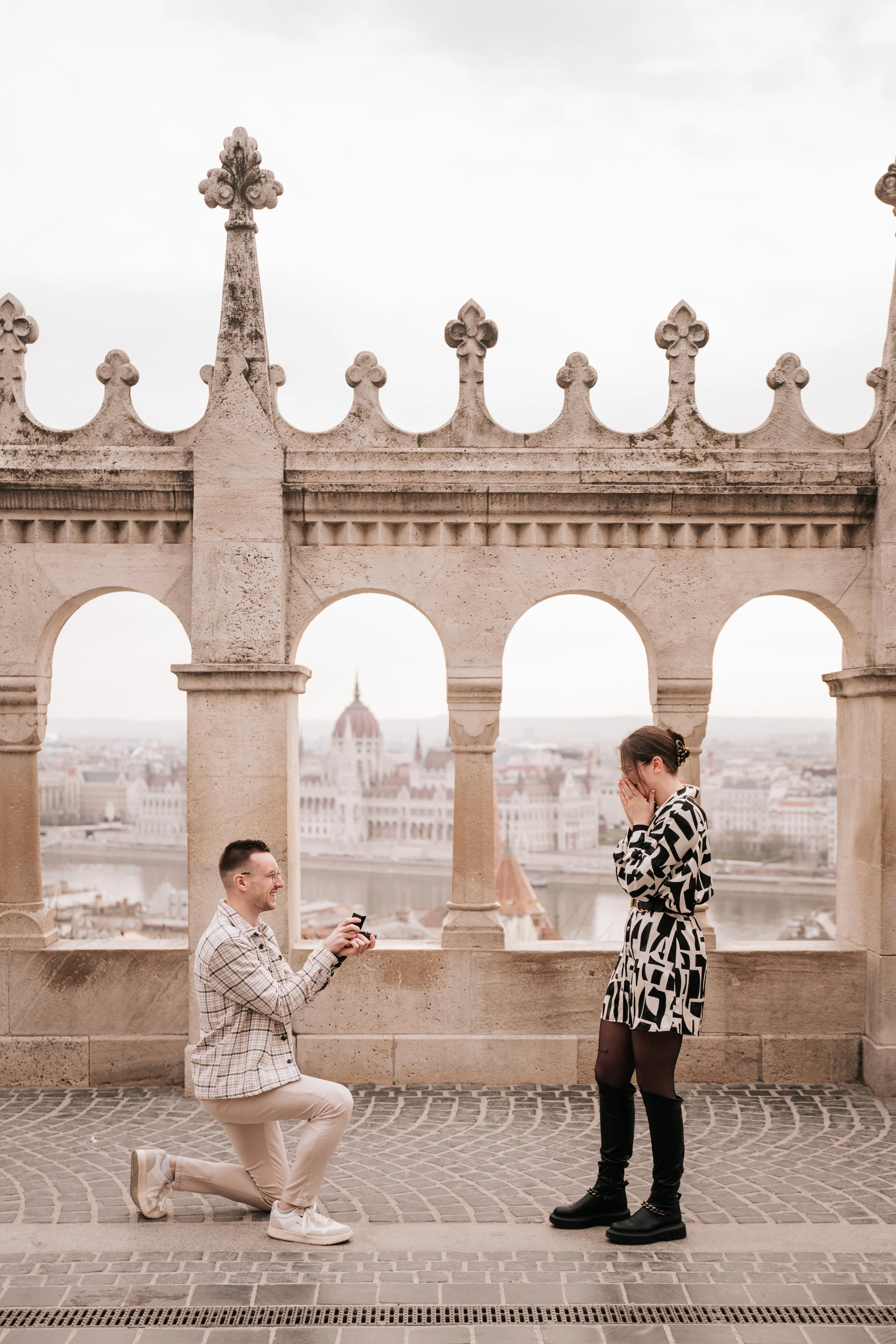 Marriage proposal beneath the neo-Gothic arches of Fisherman's Bastion