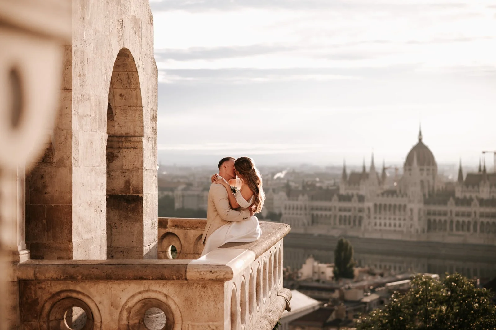 Wedding photoshoot at Fisherman’s Bastion in Budapest with panoramic city view