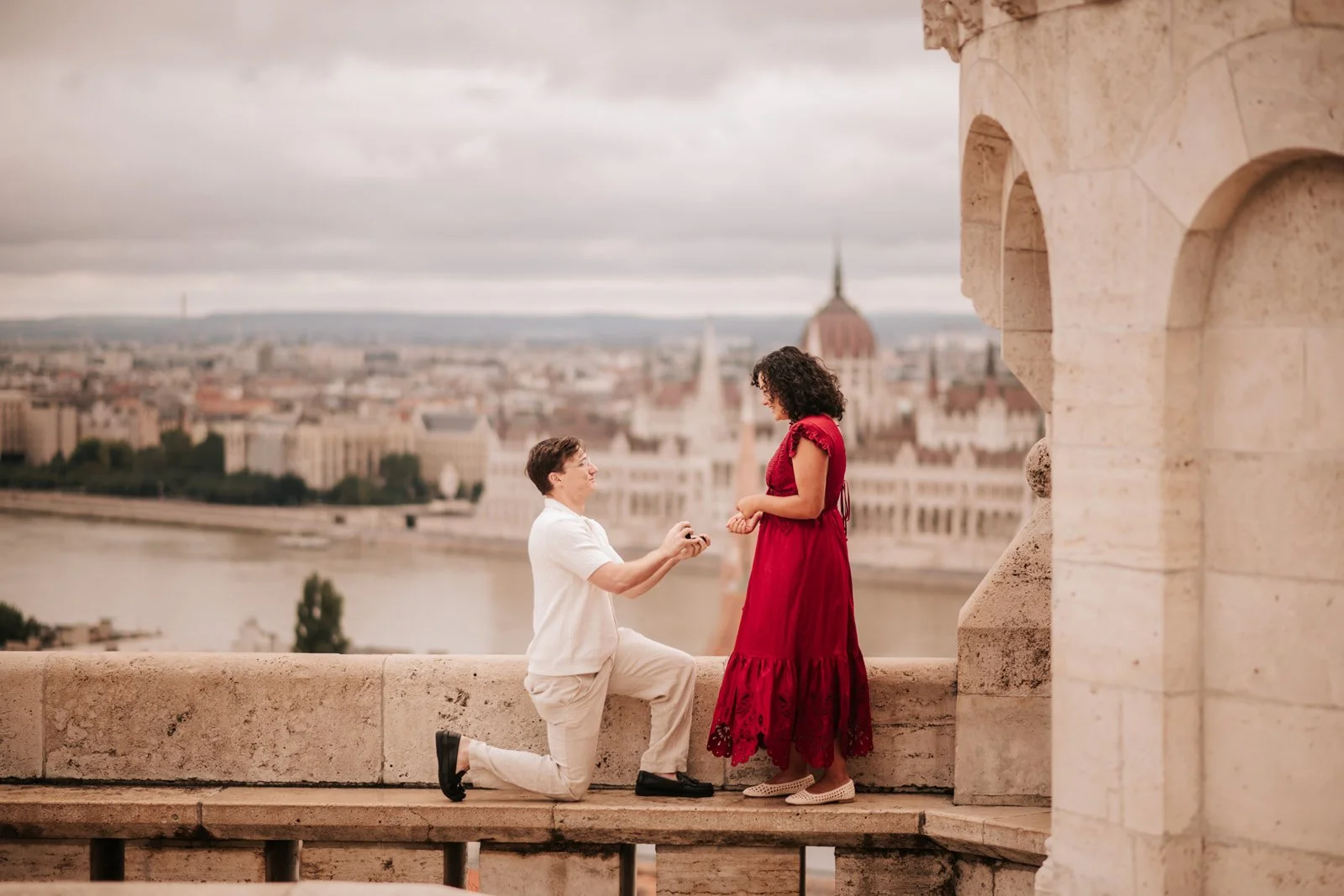 A heartfelt proposal at Fisherman’s Bastion with the Budapest Parliament in the background.