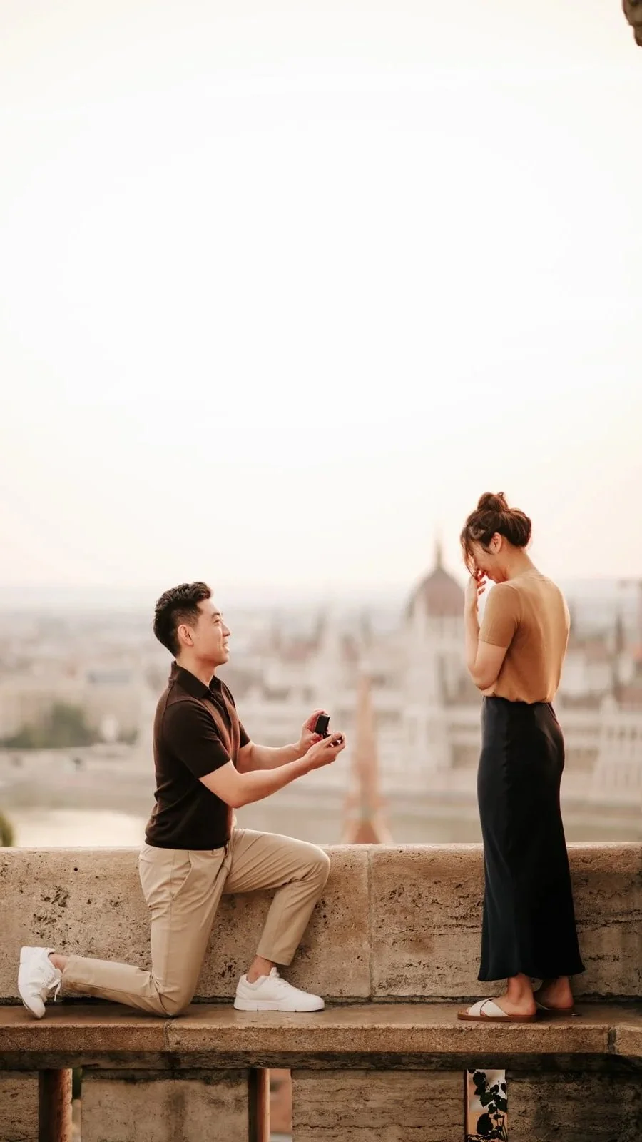 Sunrise surprise marriage proposal at Fisherman's Bastion in Budapest