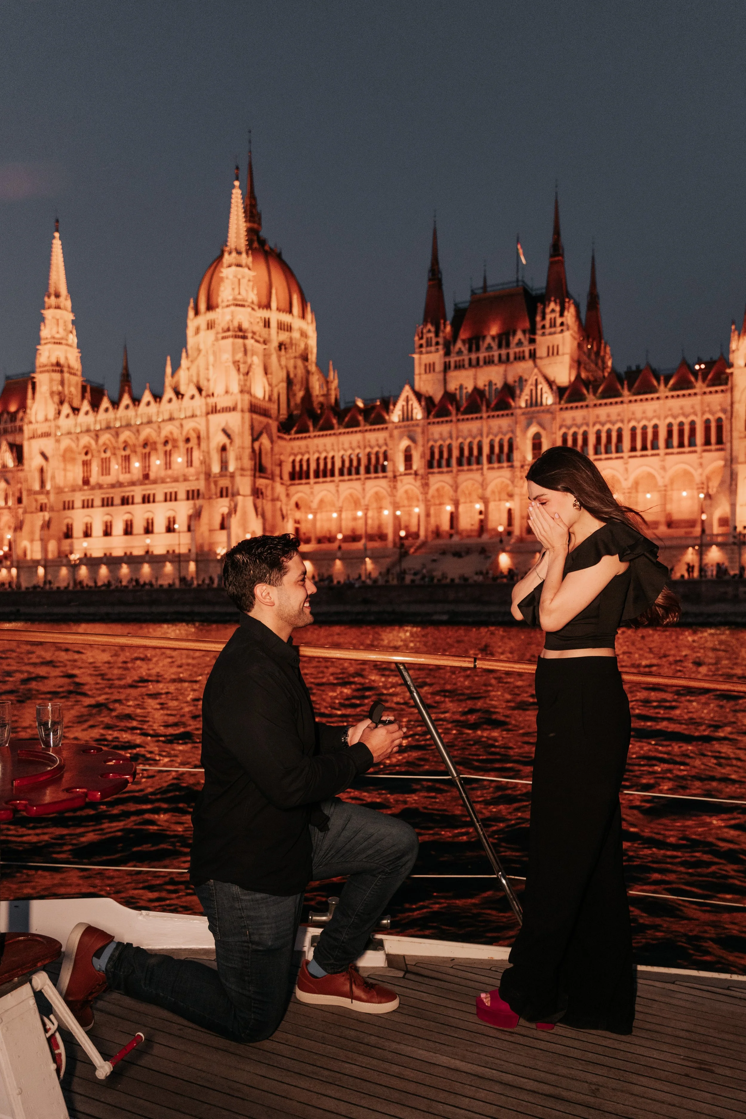 budapest private boat private proposal during night with parliament lights