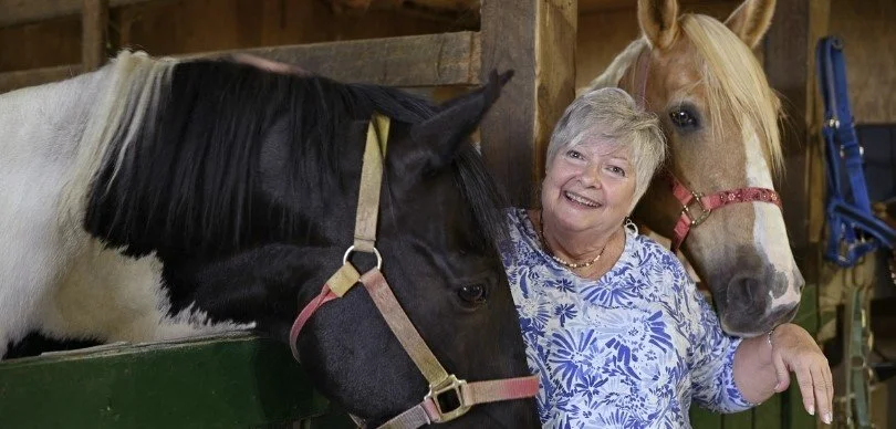 Southern Sun Farm Sanctuary volunteers spending time caring for and supporting rescued horses at the sanctuary.