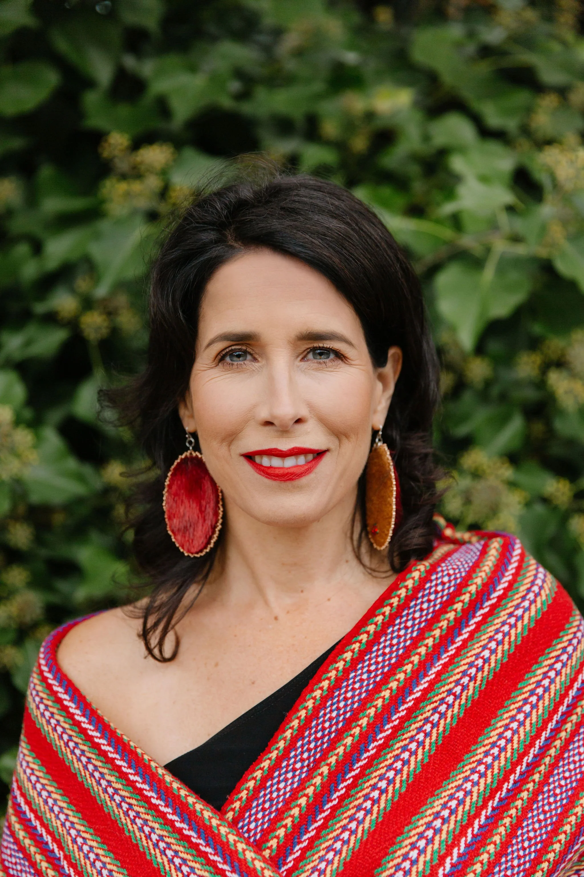 Andrea Menard, accomplished Métis singer/songwriter, actor, speaker, wellness trainer, and the founder of the Sacred Feminine Learning Lodge.