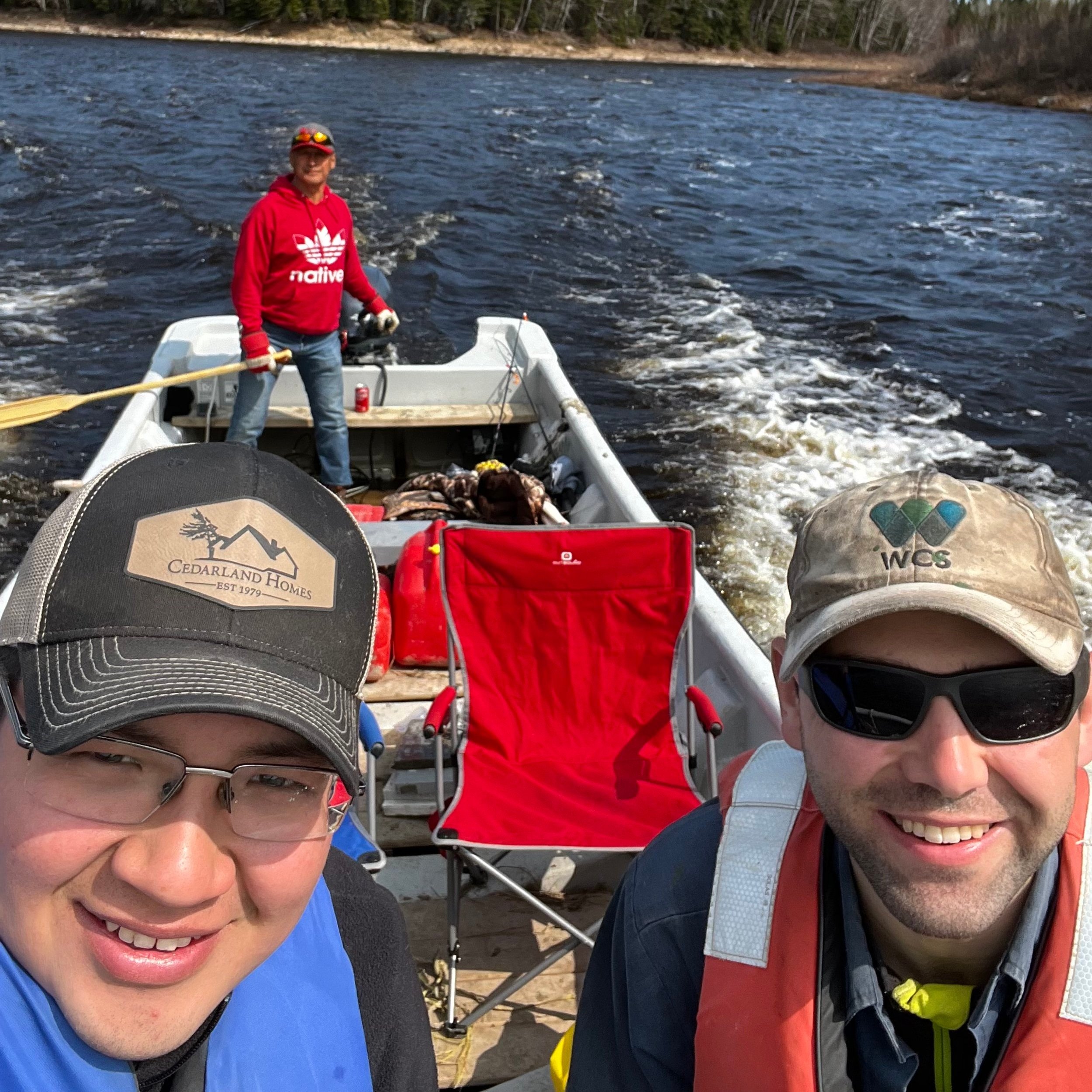 Members of team out on the water on the North French River