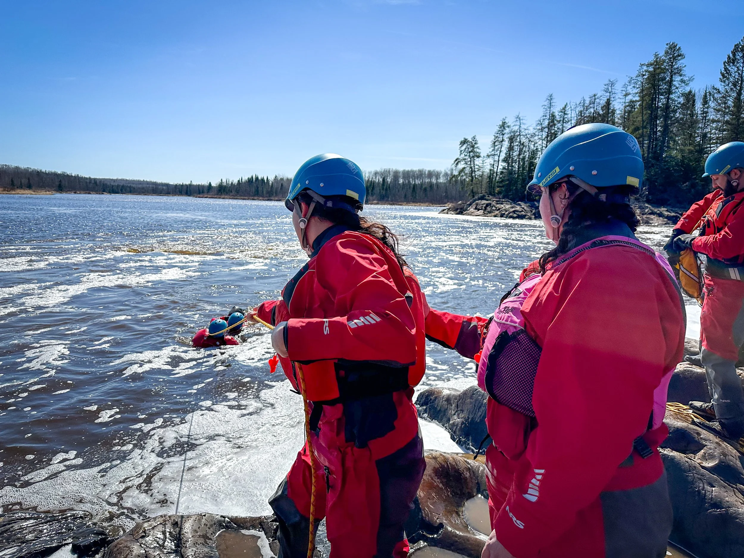 Kelsie Isheroff (left) practices retrieving subjects using a throwbag, with Claire Farrell (right) providing backup!