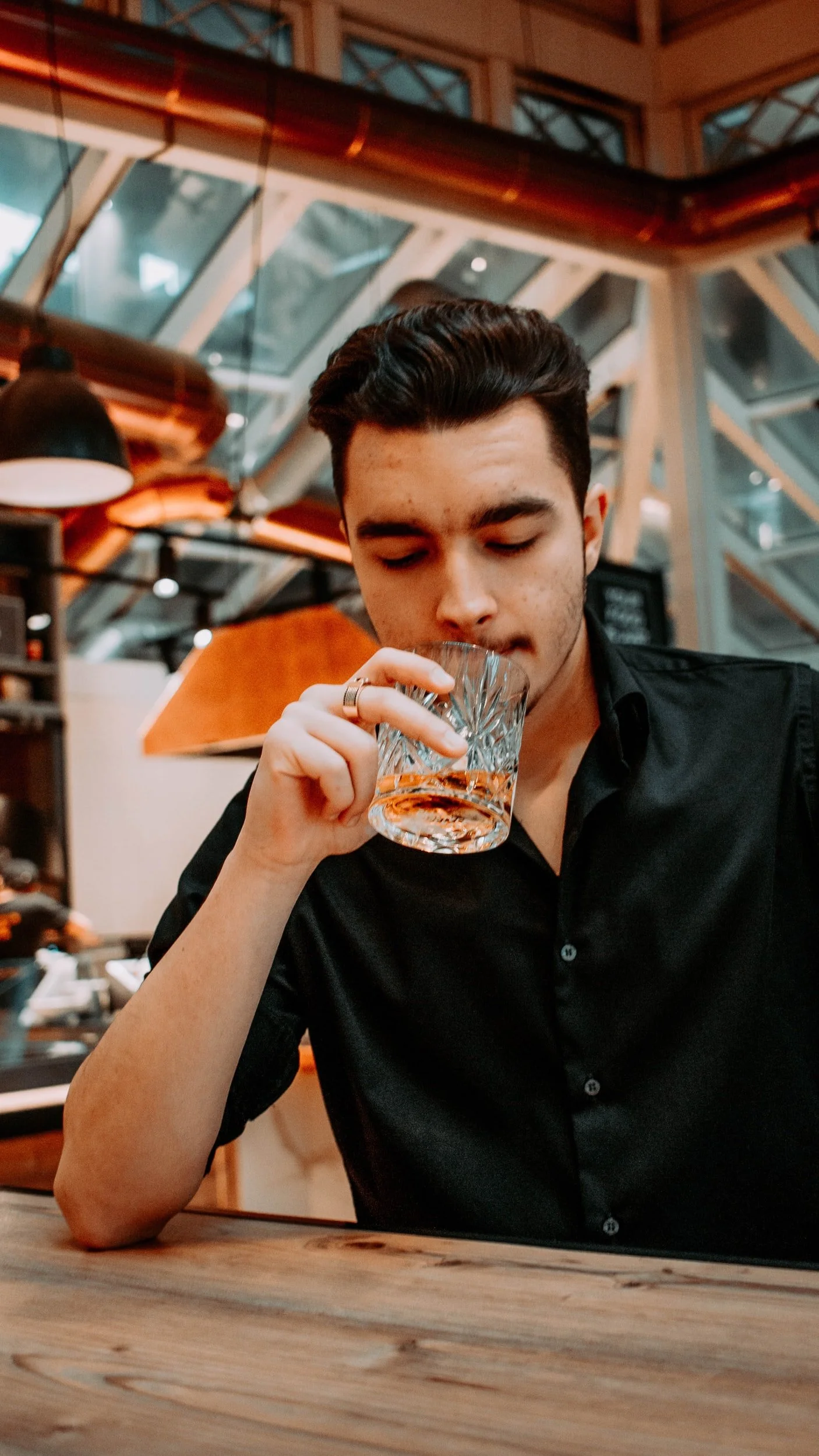 a man drinking to deal with his shame