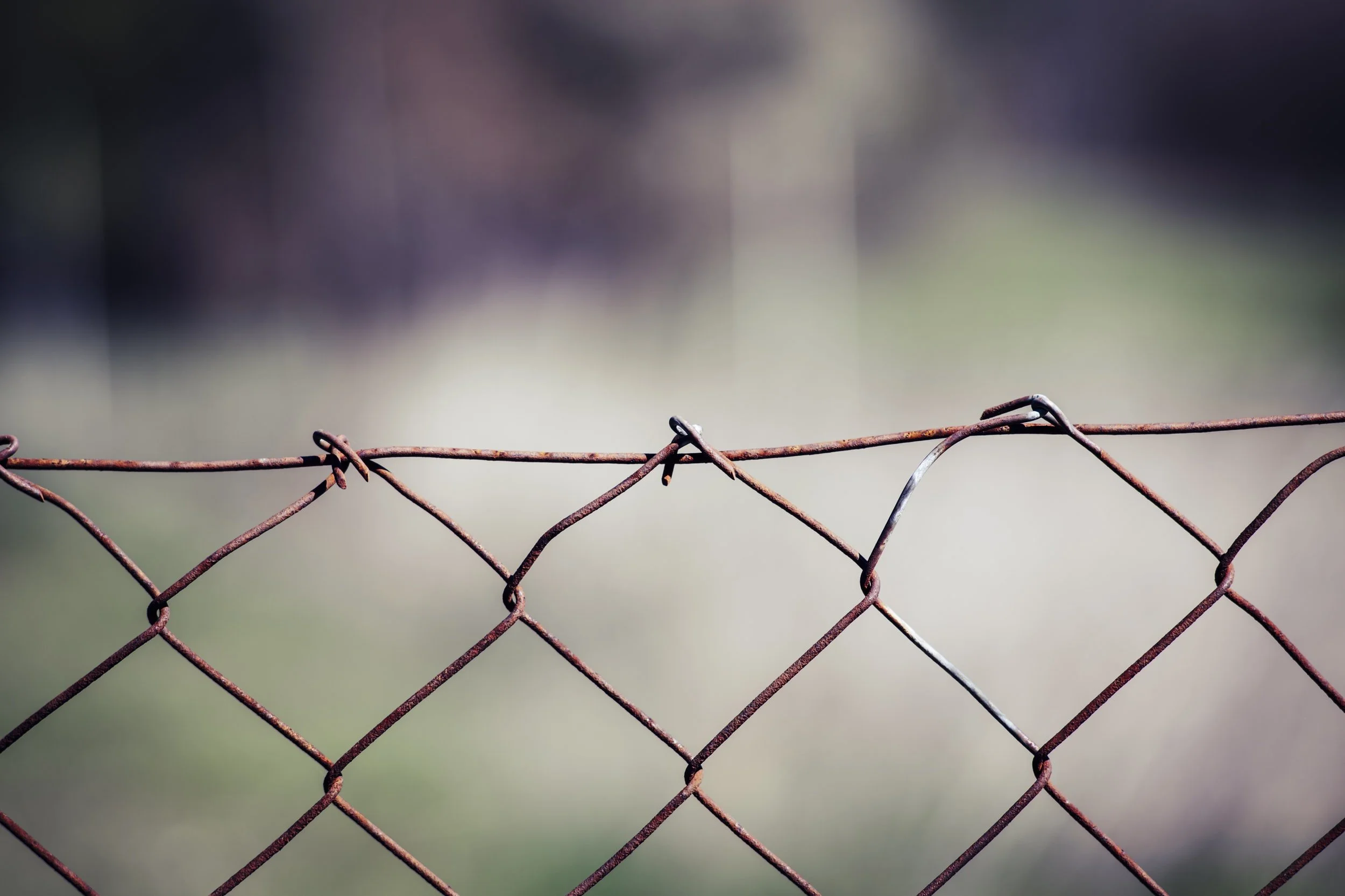 a wire fence symbolizing setting boundaries in relationships