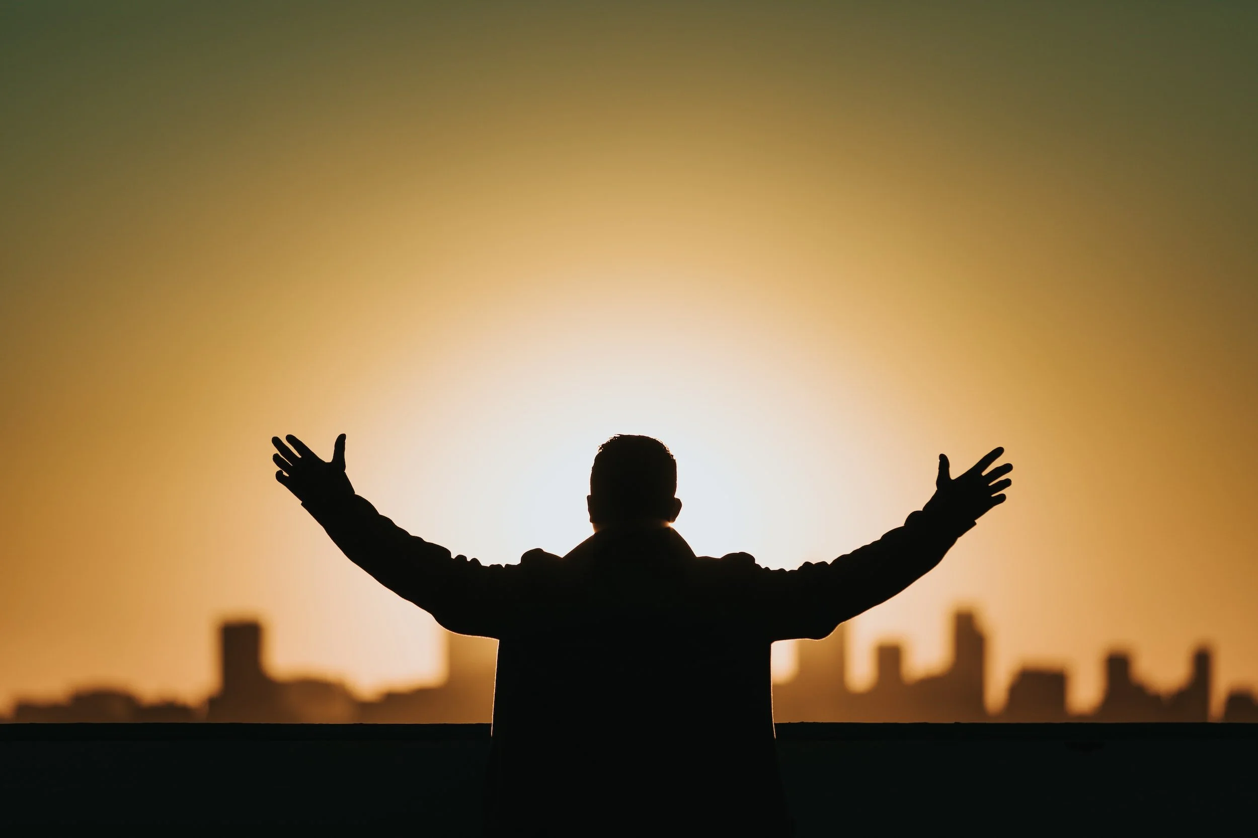 a man praying at sunrise, F. Remy Diederich