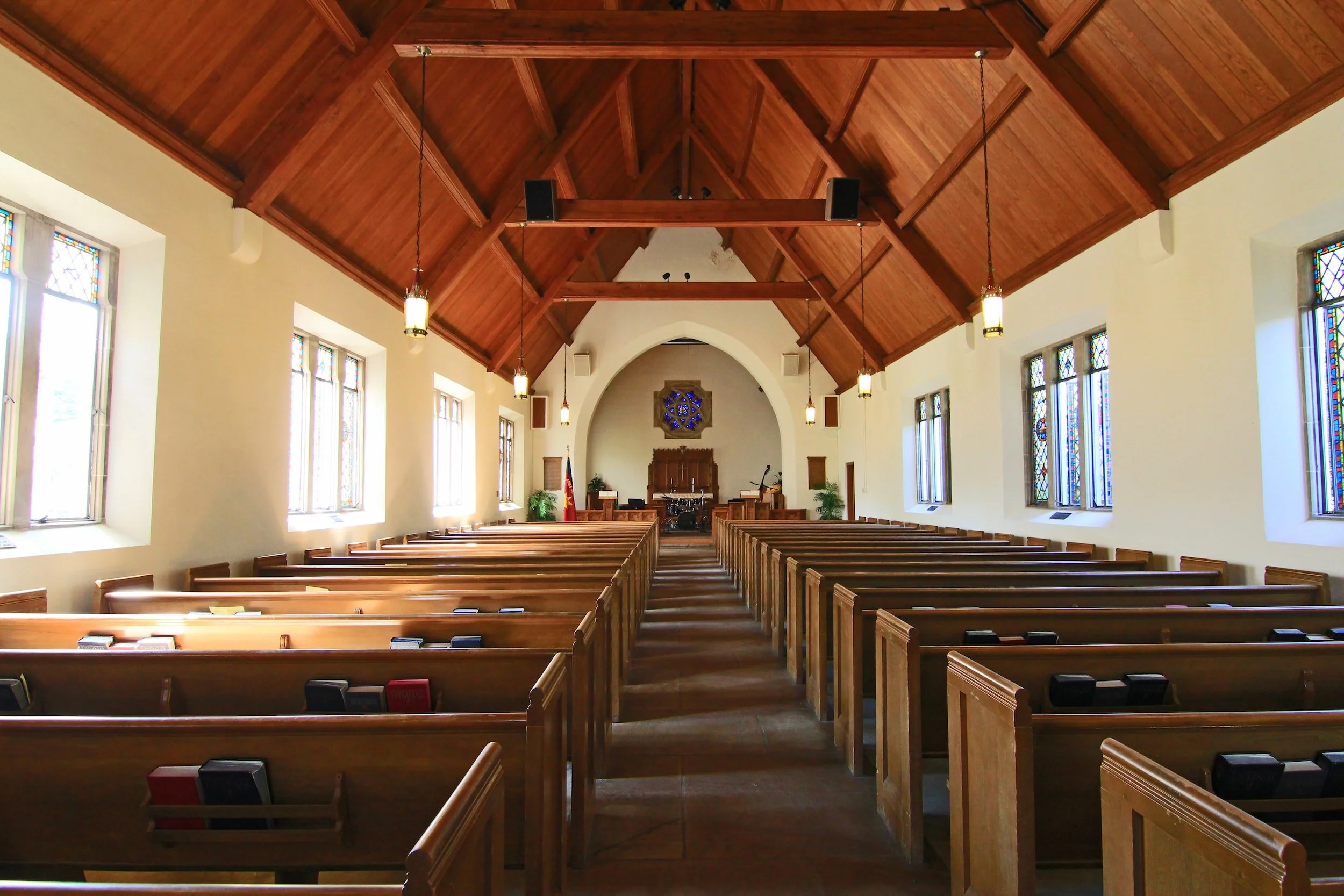 an empty church signifying that many people are leaving church